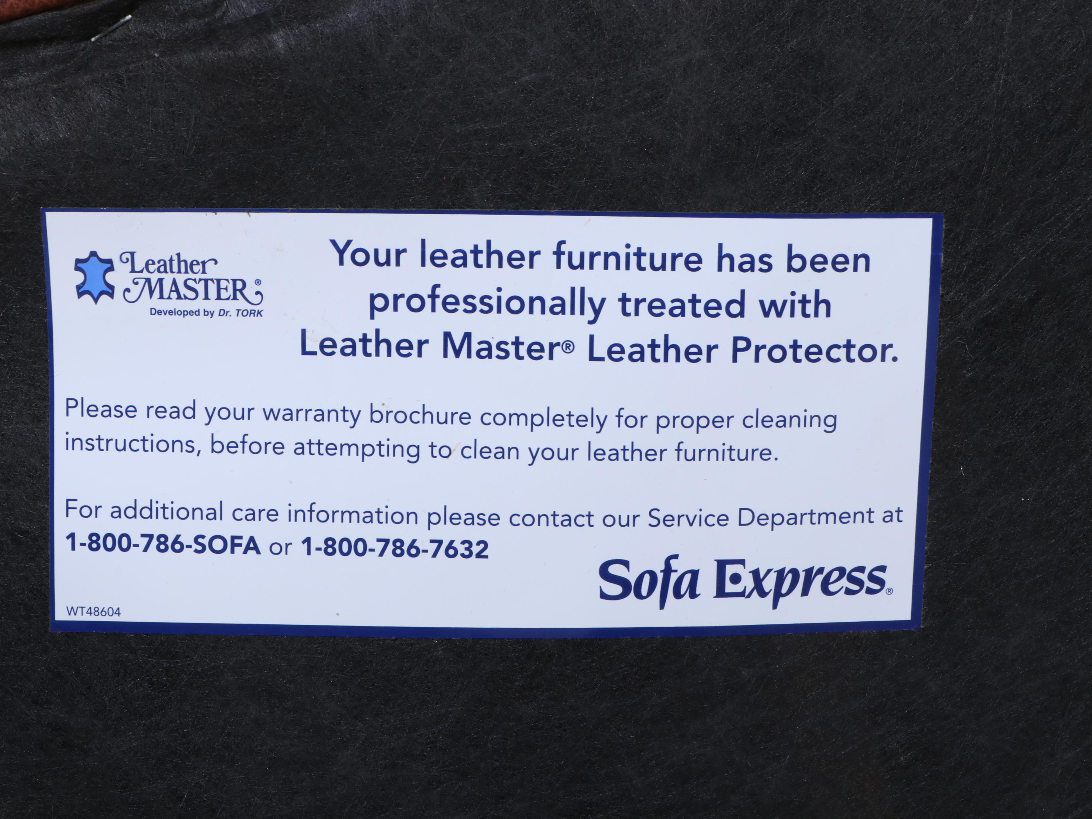 Sofa Express Leather Armchair and Ottoman