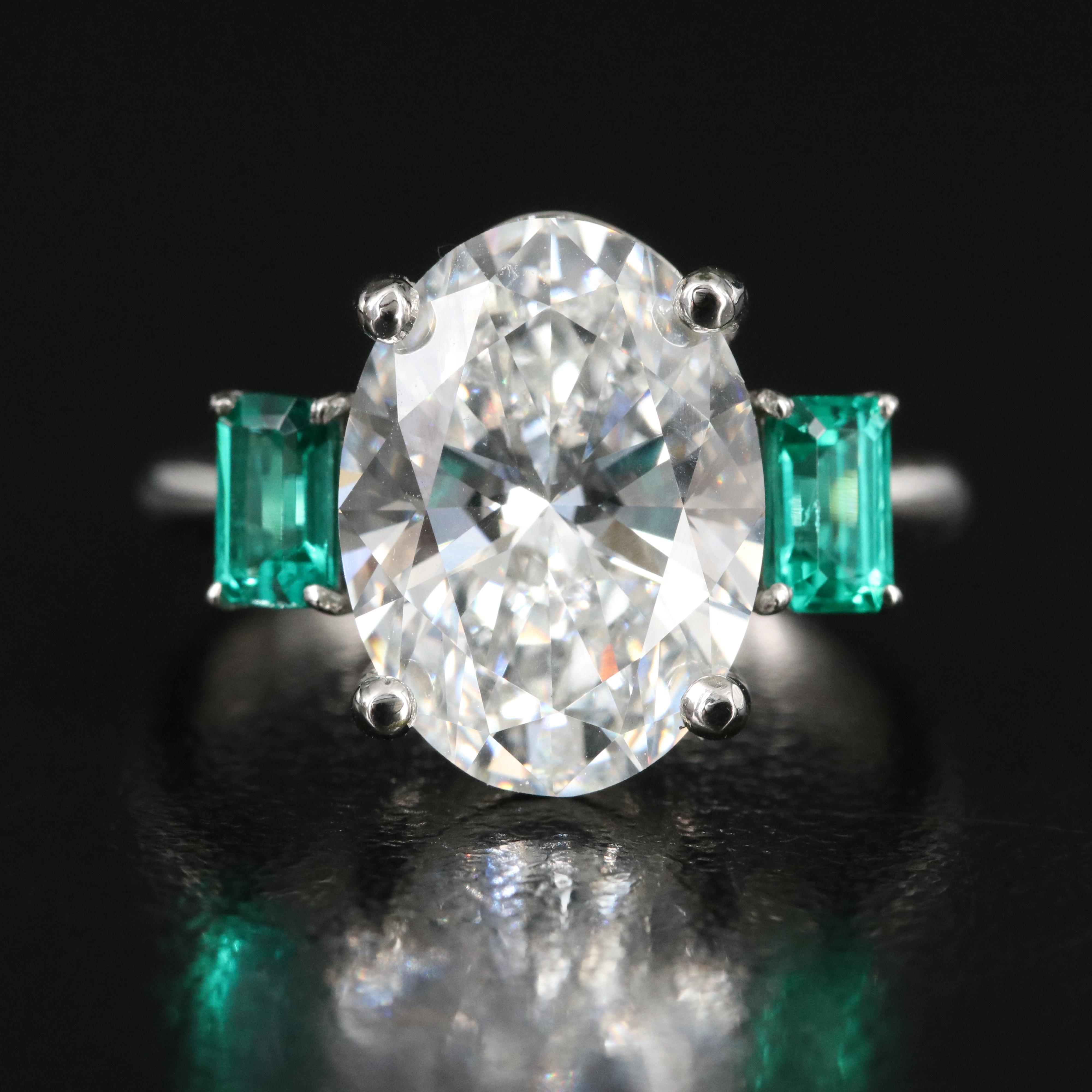 Platinum 4.93 CT Lab Grown Diamond and Emerald Ring with IGI Report