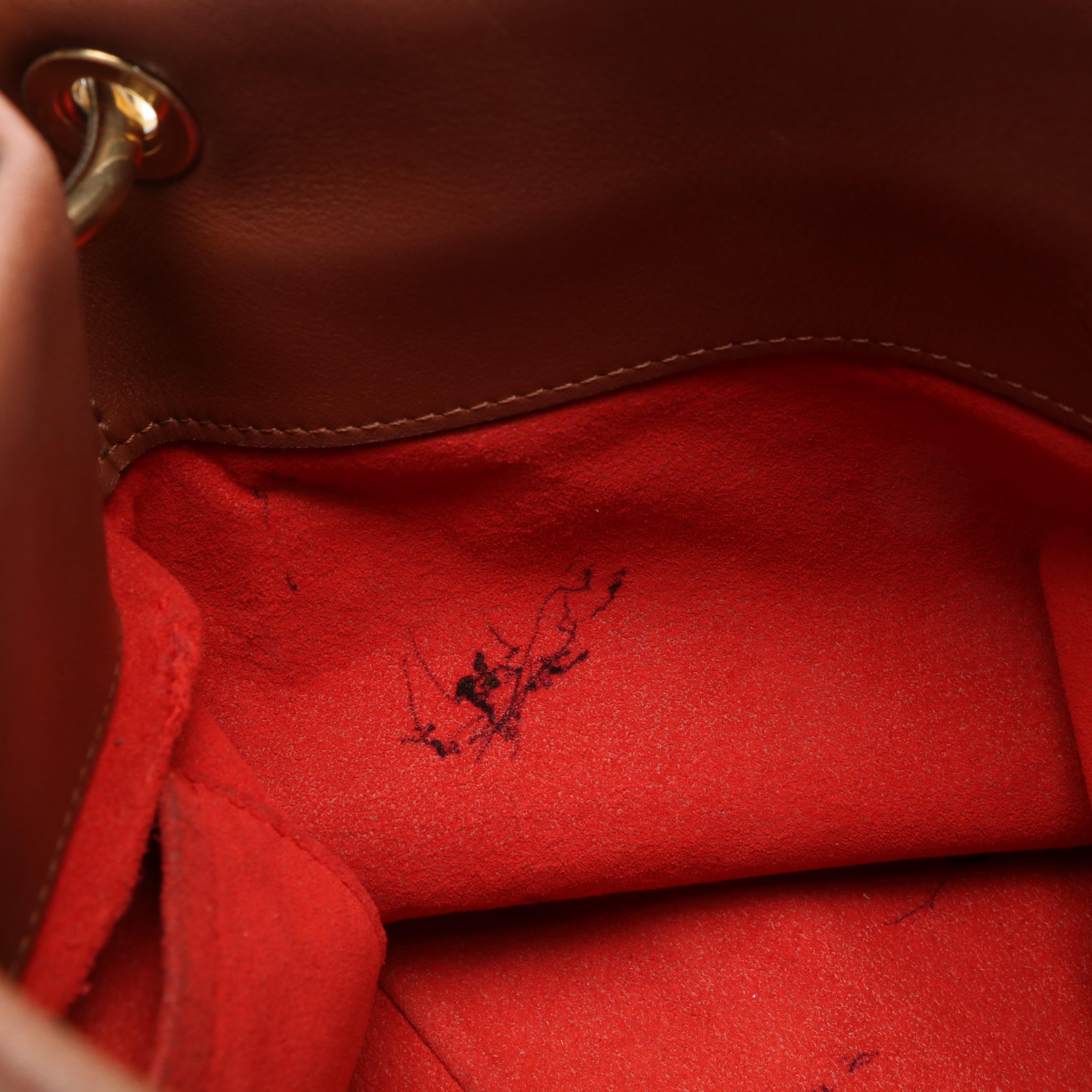 Louis Vuitton Tuileries Besace Hobo Bag in Monogram Coated Canvas and Leather