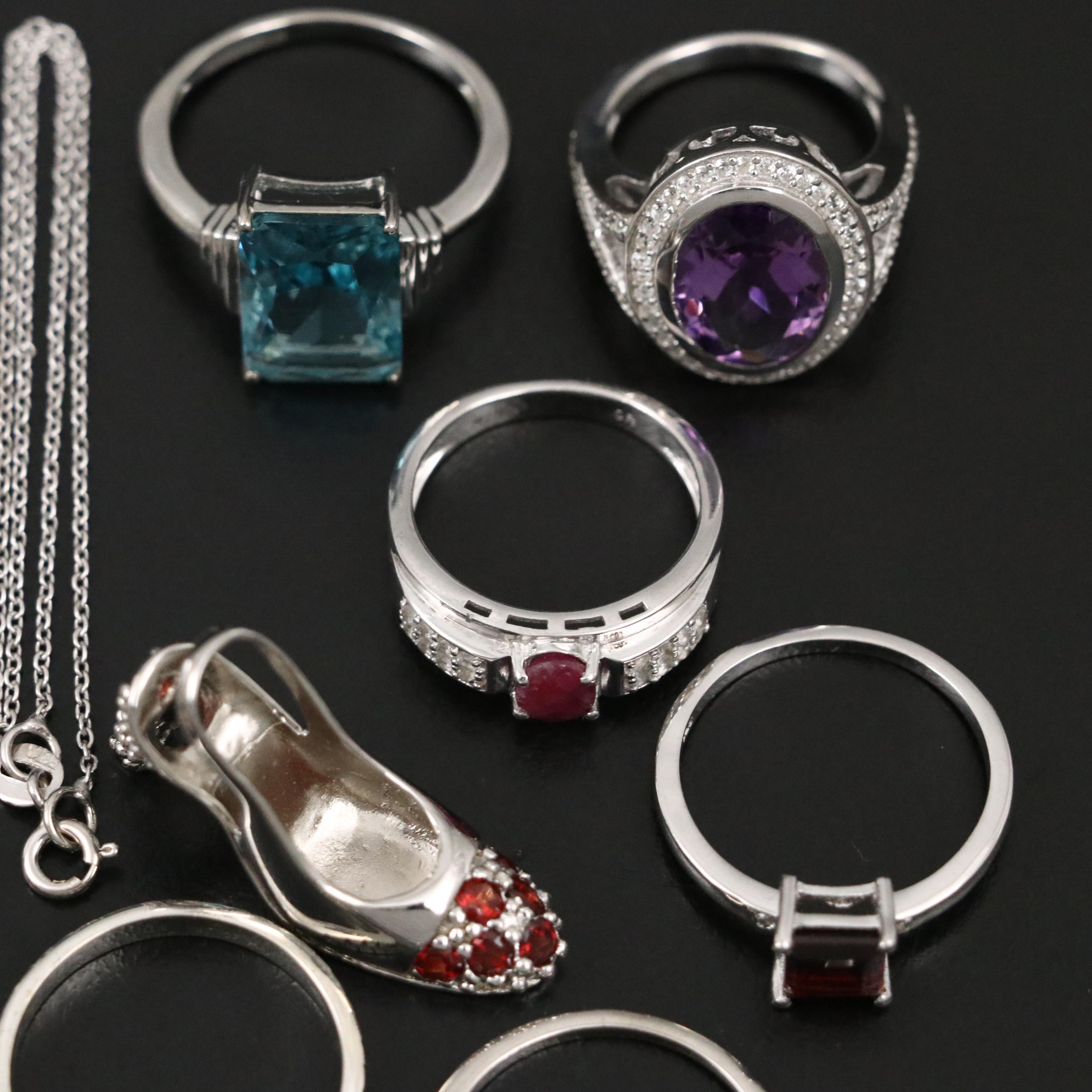 Group of 14 Assorted Sterling Silver Rings, Necklaces, Earrings, and Pendants