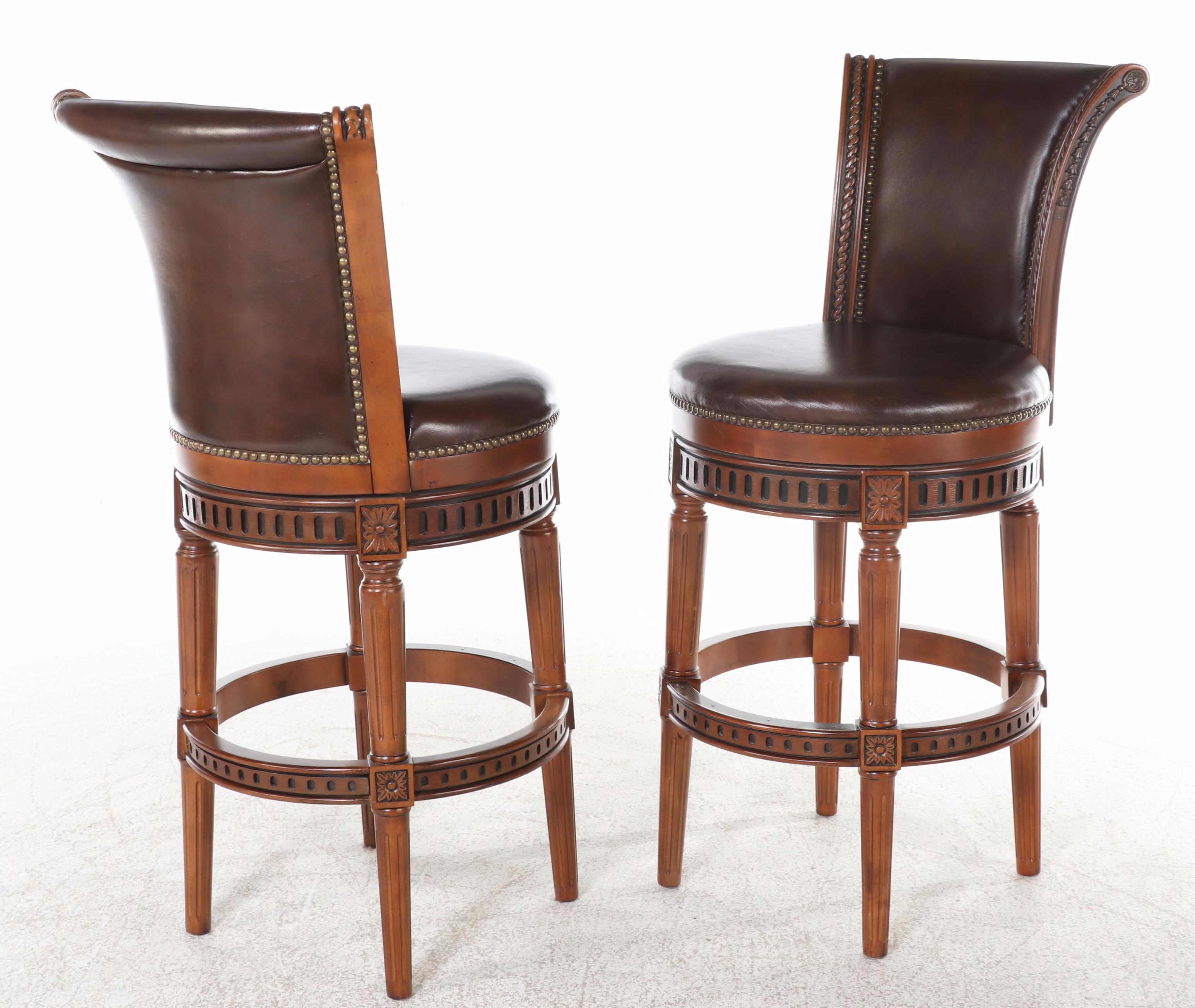 Four Frontgate "Manchester" Birch and Leather Swivel Bar Stools with Nailheads