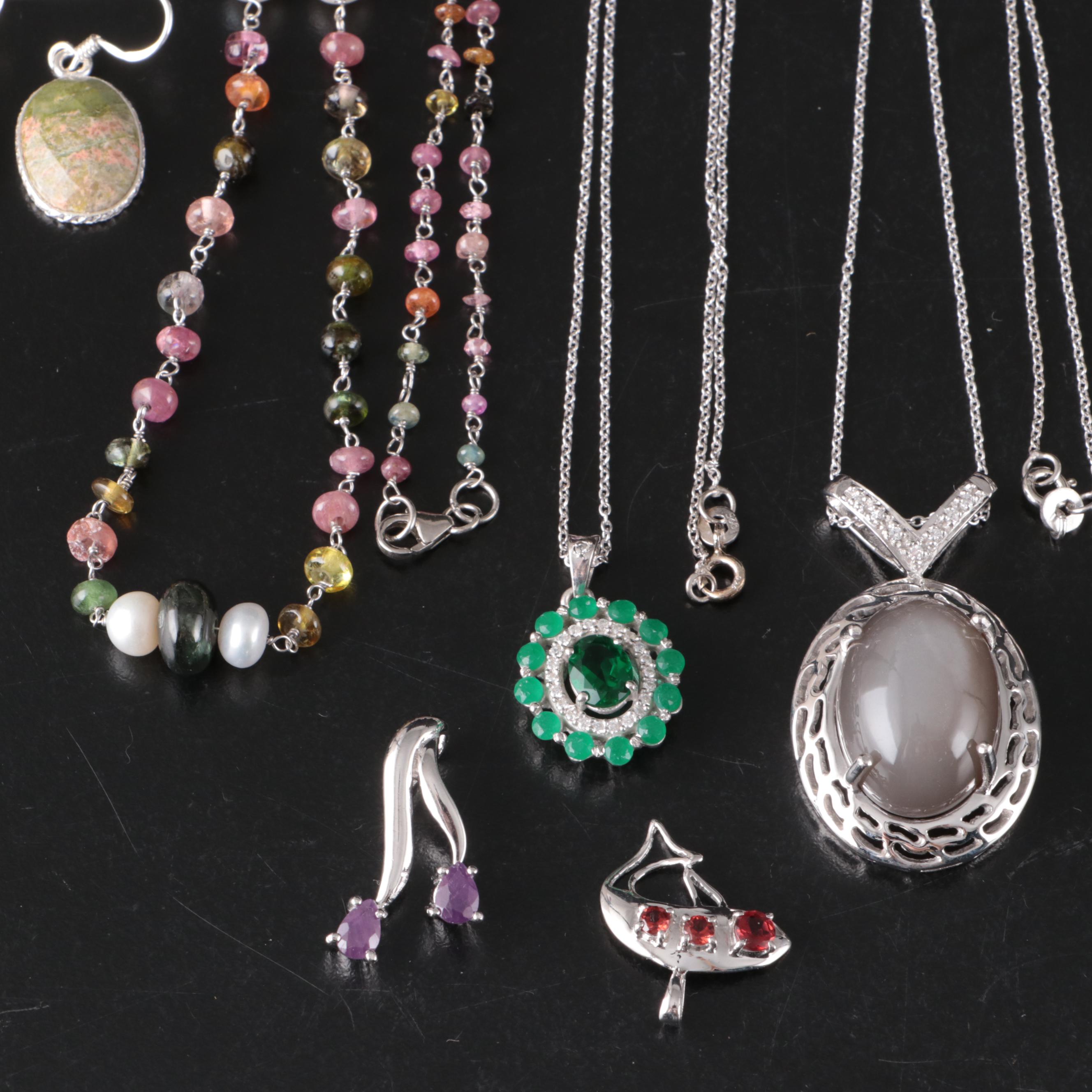 Group of 14 Assorted Sterling Silver Rings, Necklaces, Earrings, and Pendants