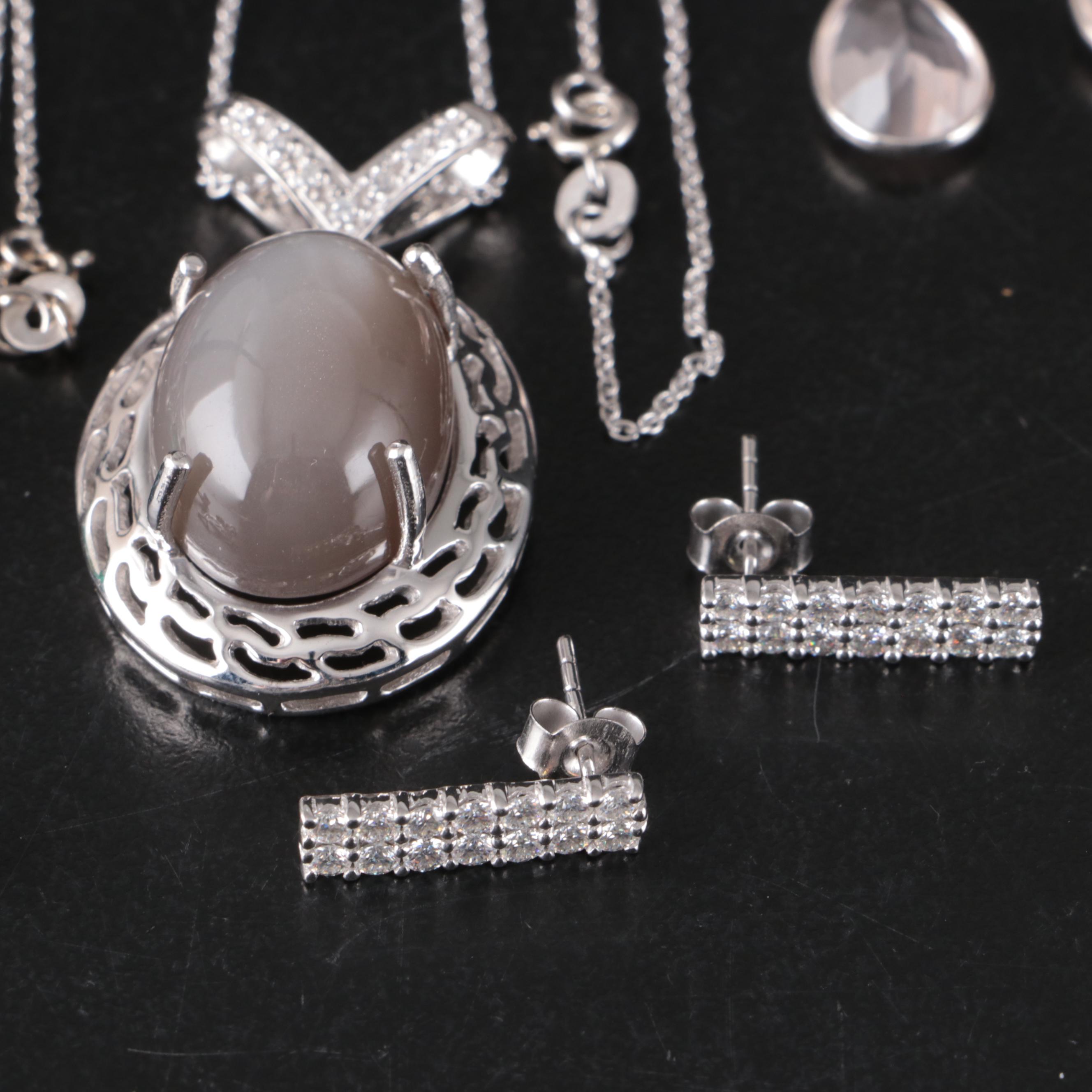 Group of 14 Assorted Sterling Silver Rings, Necklaces, Earrings, and Pendants