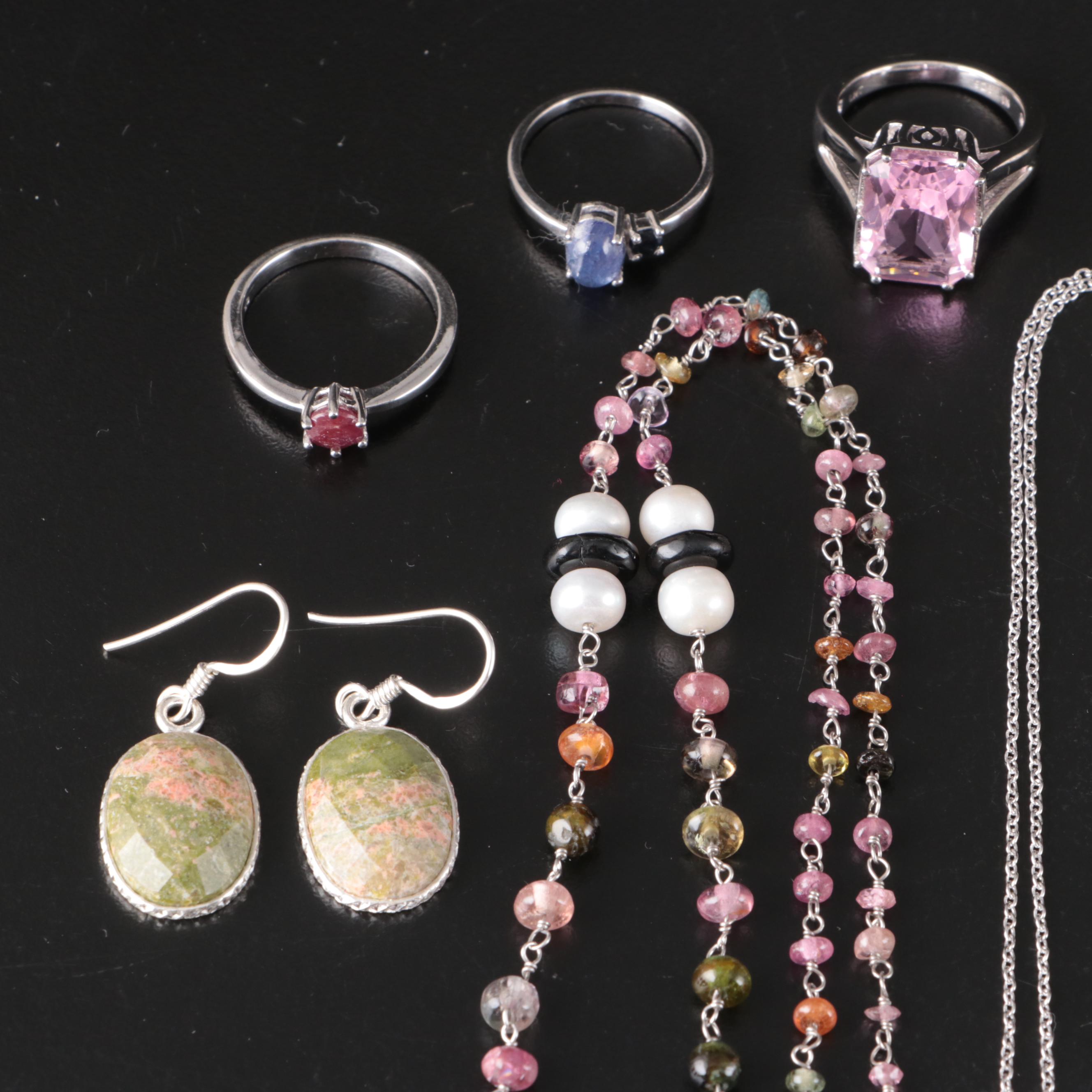 Group of 14 Assorted Sterling Silver Rings, Necklaces, Earrings, and Pendants