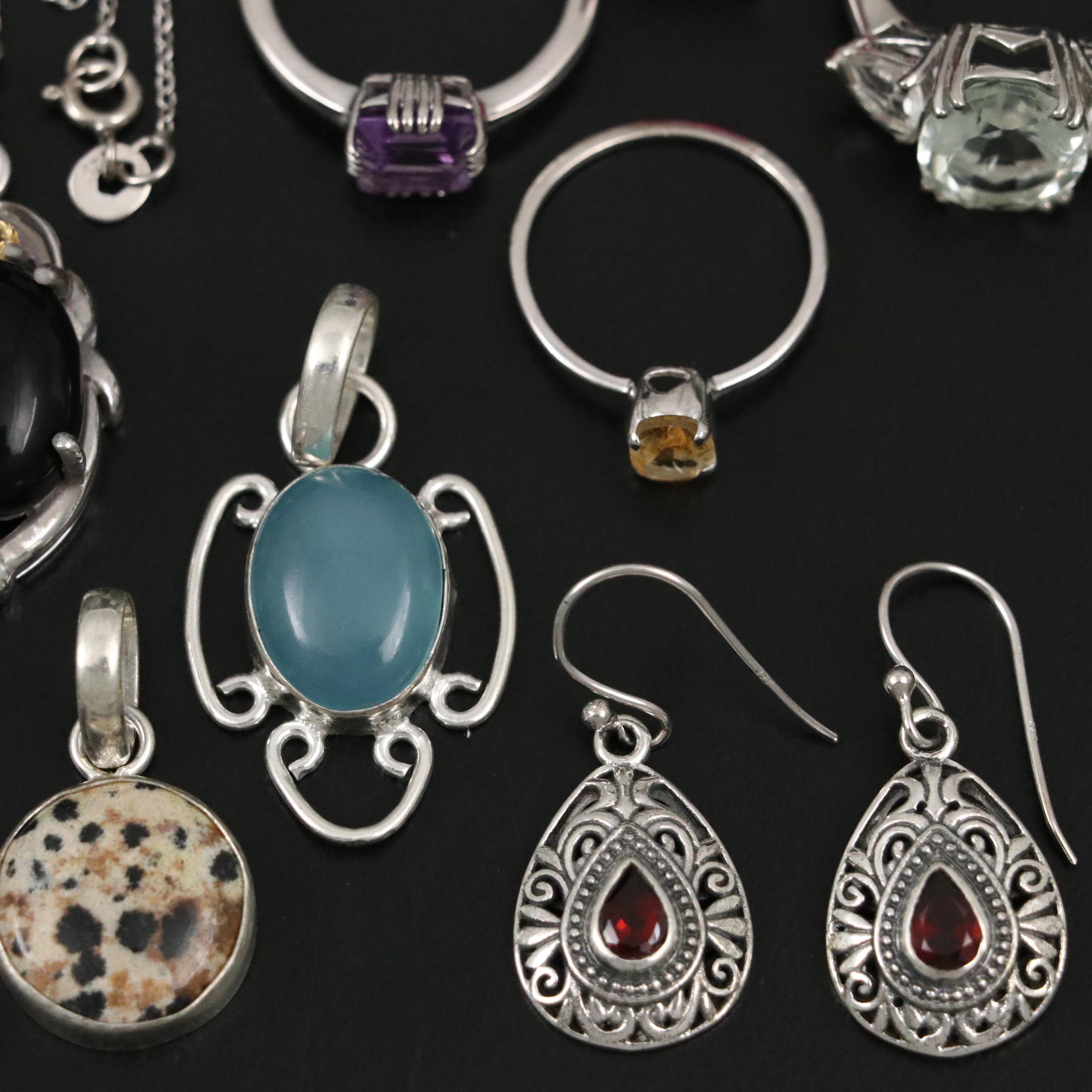 Group of 14 Assorted Sterling Silver Rings, Necklaces, Earrings, and Pendants