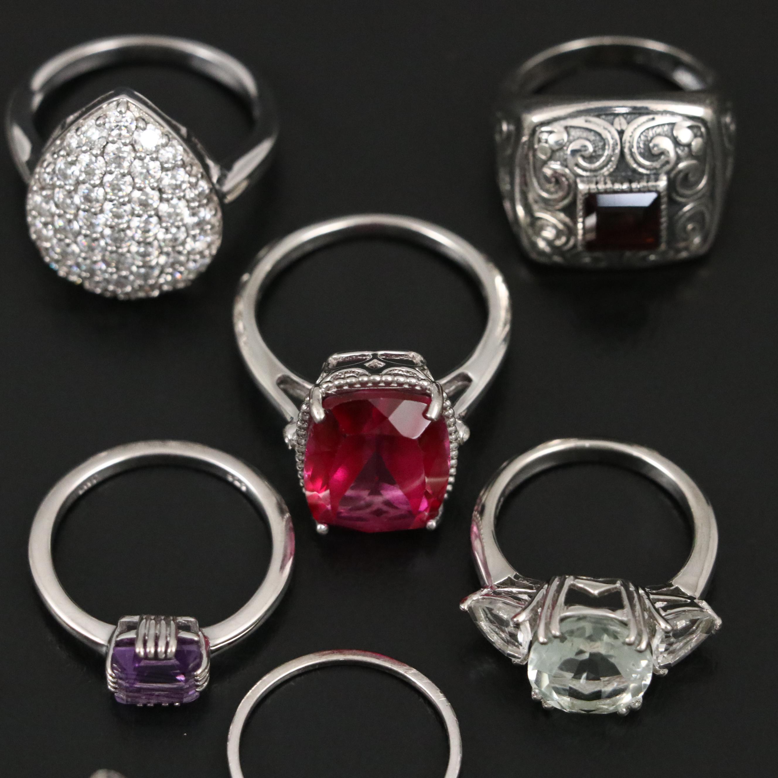 Group of 14 Assorted Sterling Silver Rings, Necklaces, Earrings, and Pendants