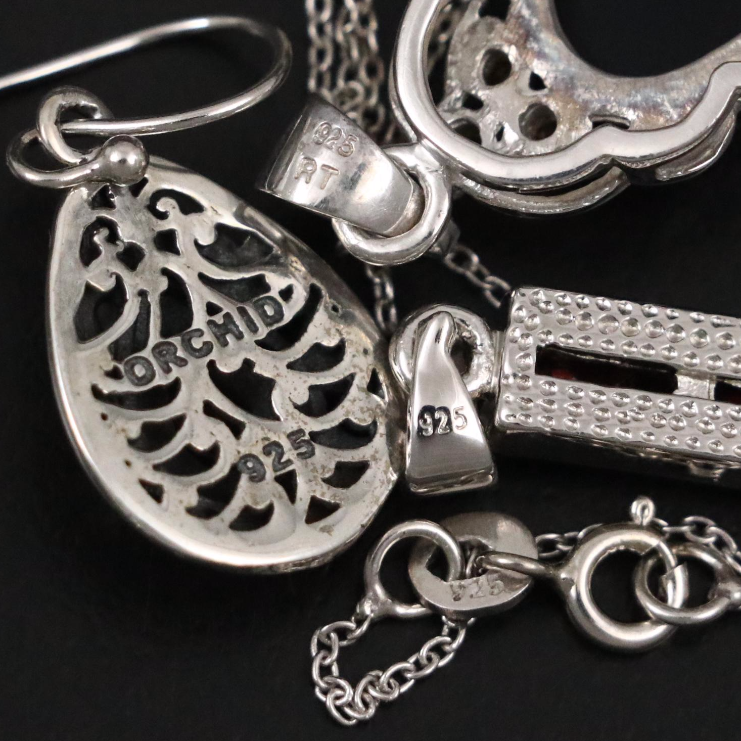 Group of 14 Assorted Sterling Silver Rings, Necklaces, Earrings, and Pendants