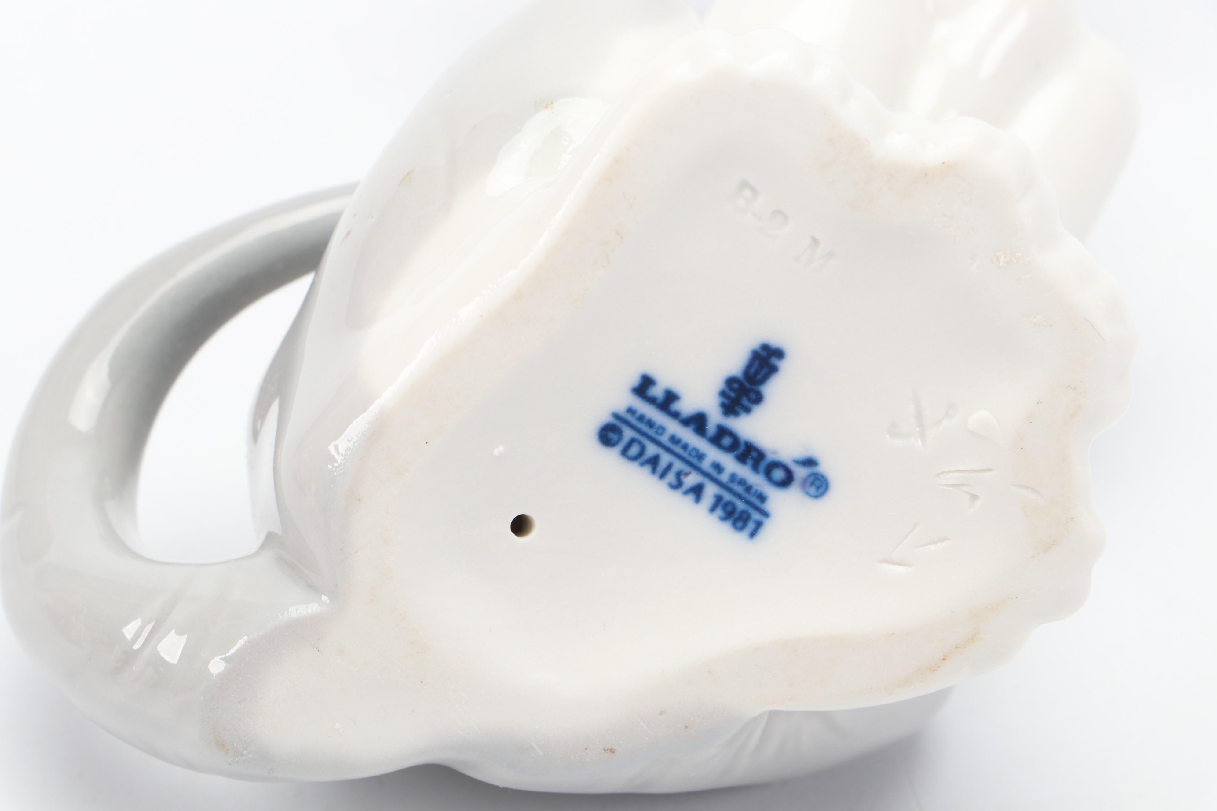 Lladró "Surprised Cat" and Other Porcelain Cat Figurines