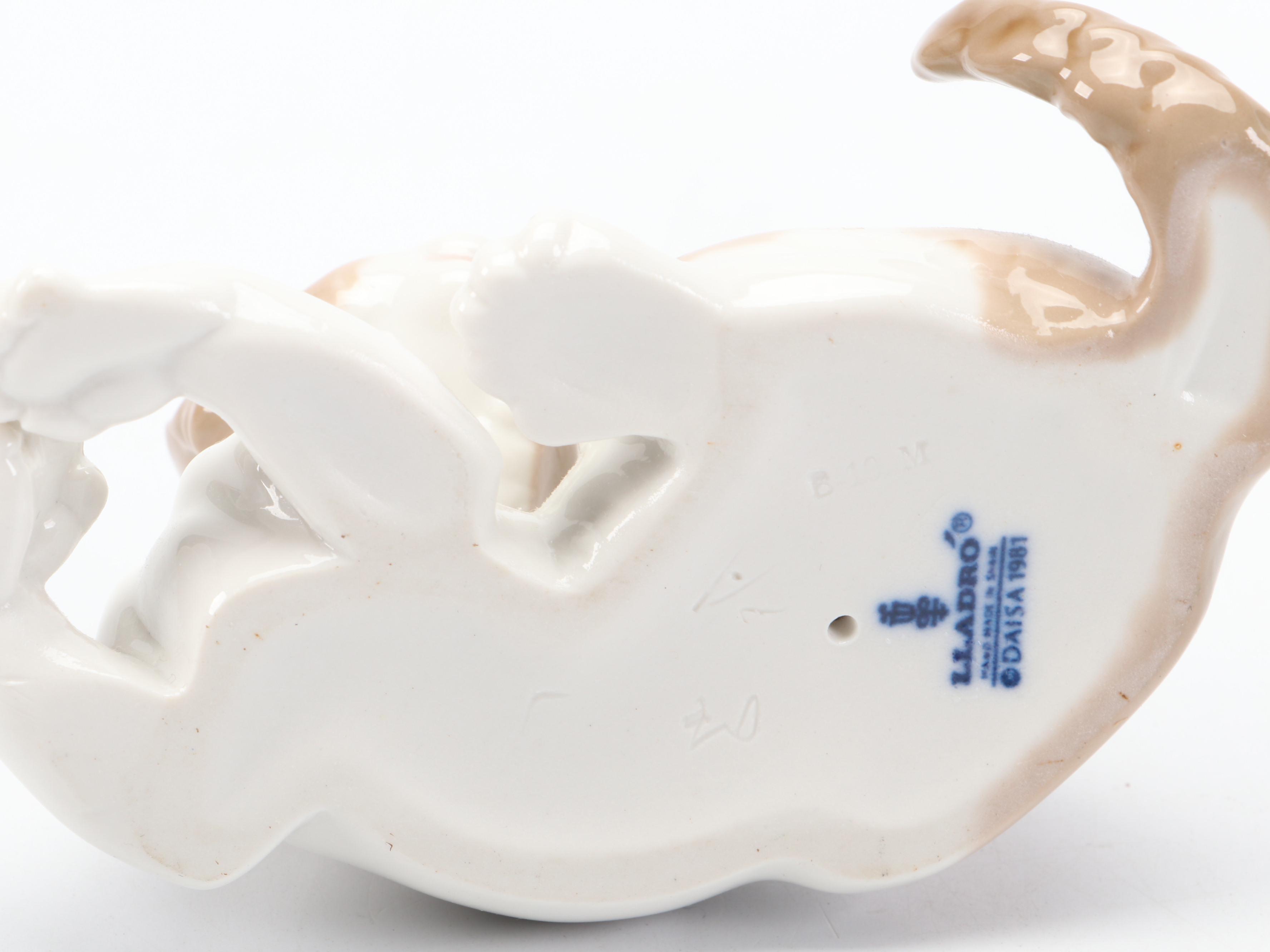 Lladró "Surprised Cat" and Other Porcelain Cat Figurines