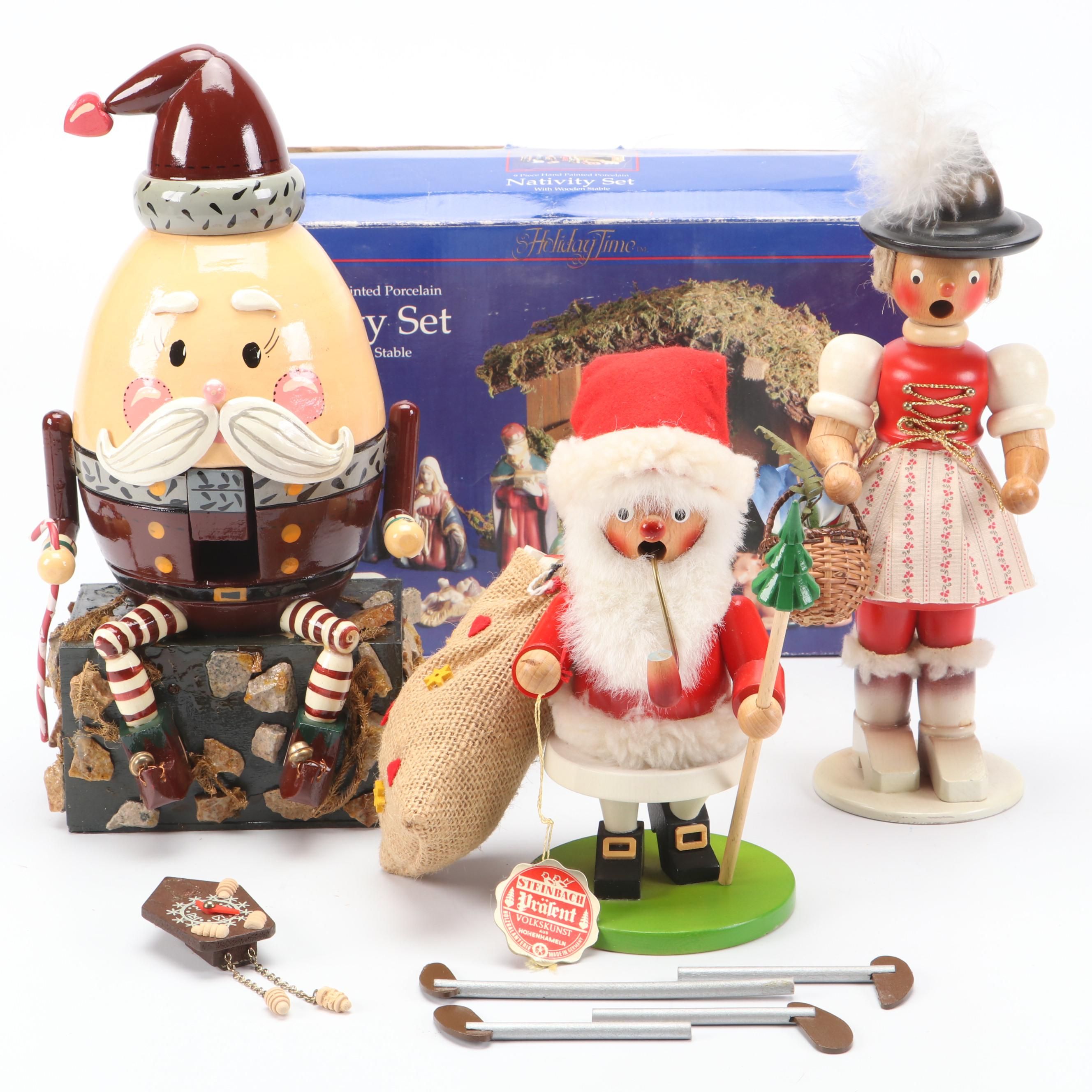 Holiday Time Ceramic Nativity Set with Steinbach and Other Nutcrackers