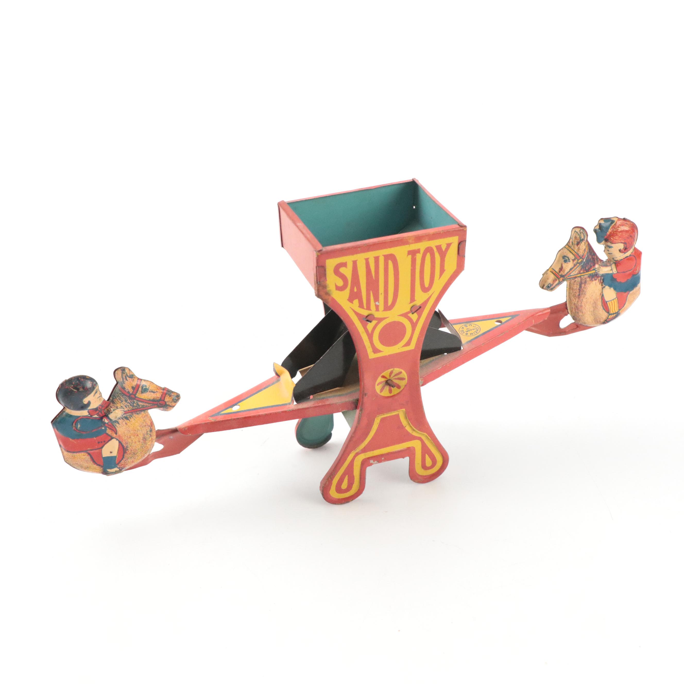 J. Chein & Co. Tin Lithograph Teeter-Totter Sand Toy, Mid-20th Century