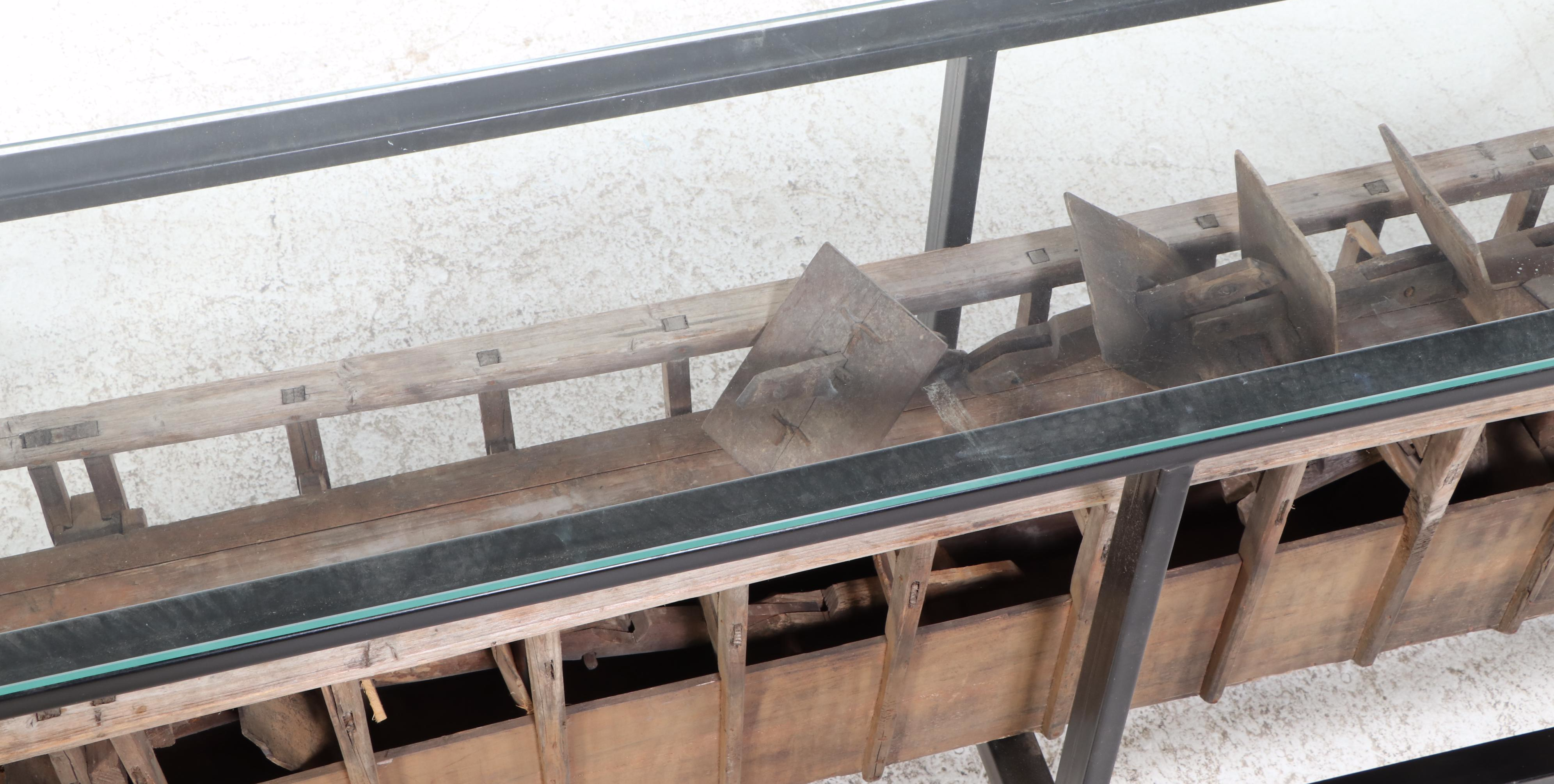 Metal and Glass Console Table with Folk Art Wooden Paddle Boat