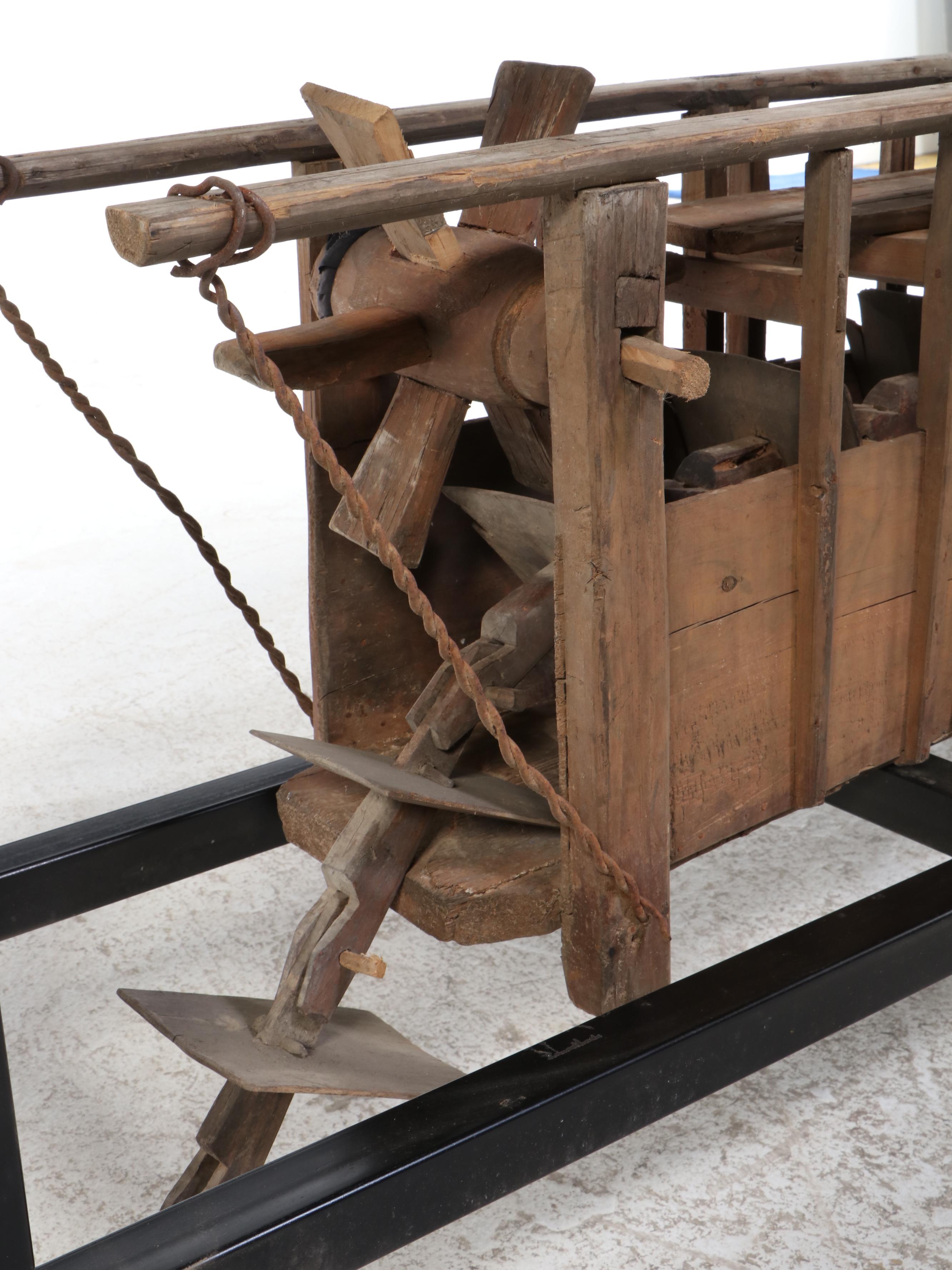 Metal and Glass Console Table with Folk Art Wooden Paddle Boat