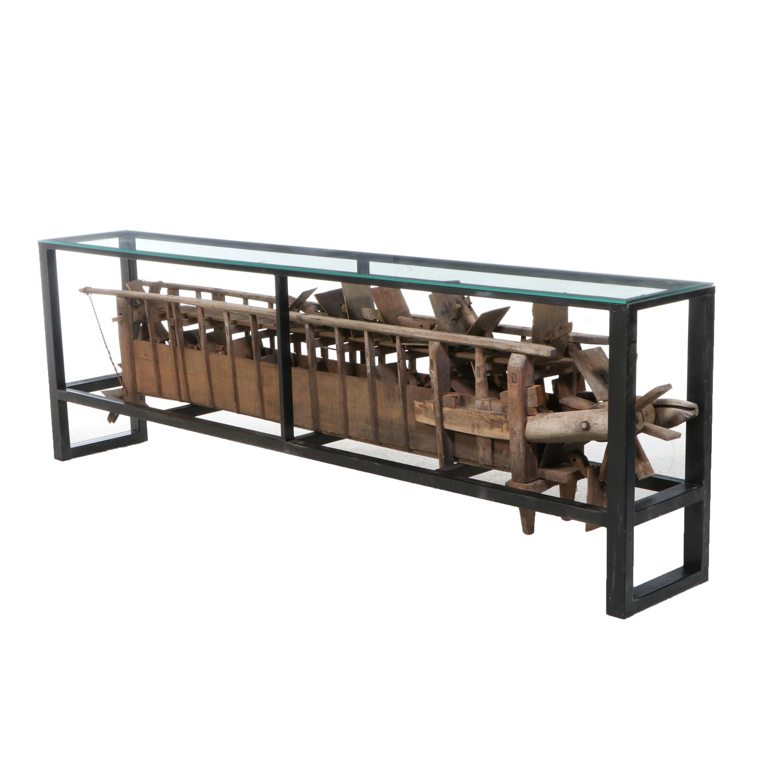 Metal and Glass Console Table with Folk Art Wooden Paddle Boat