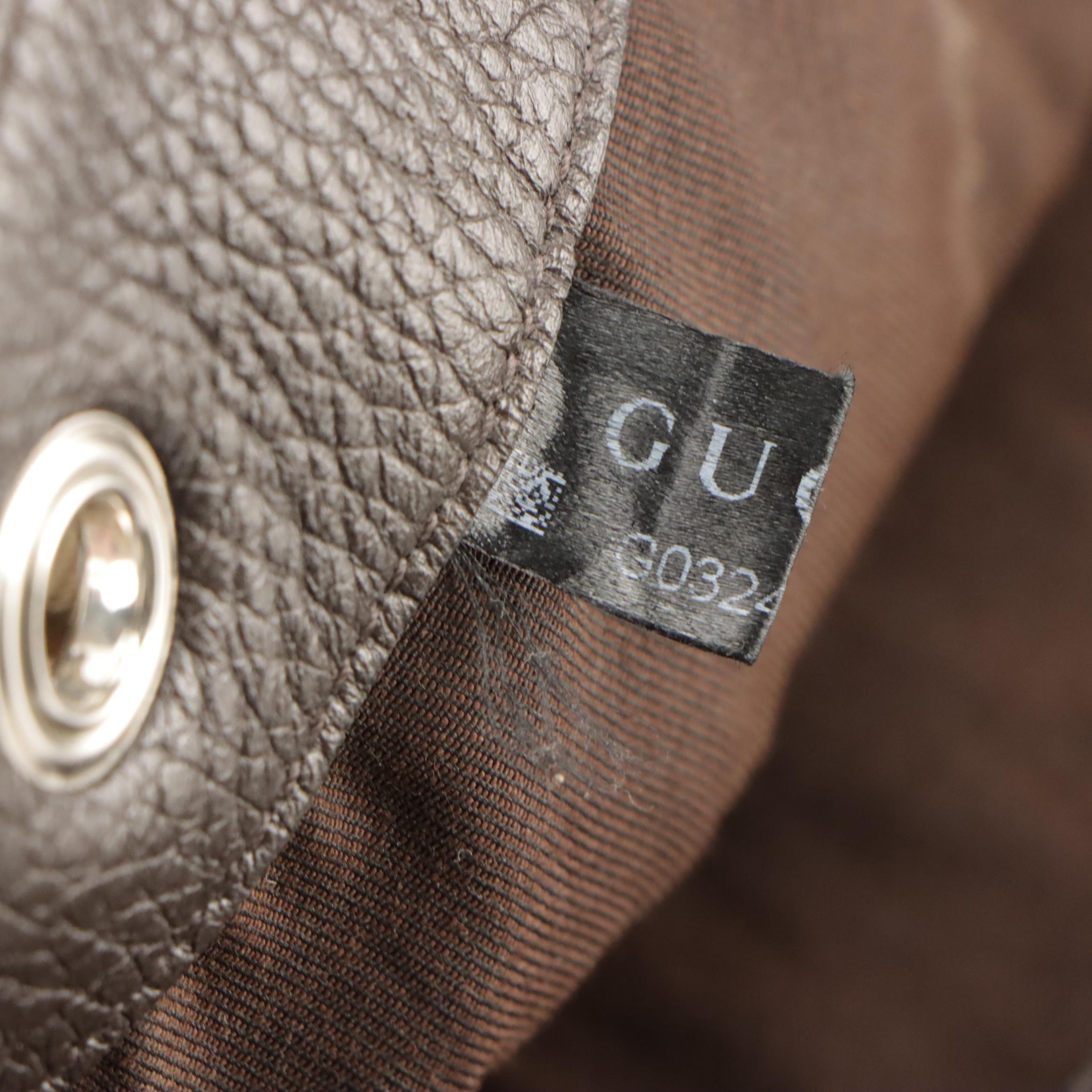 Gucci Drawstring Backpack Bag in GG Canvas with Pebbled Leather Trim