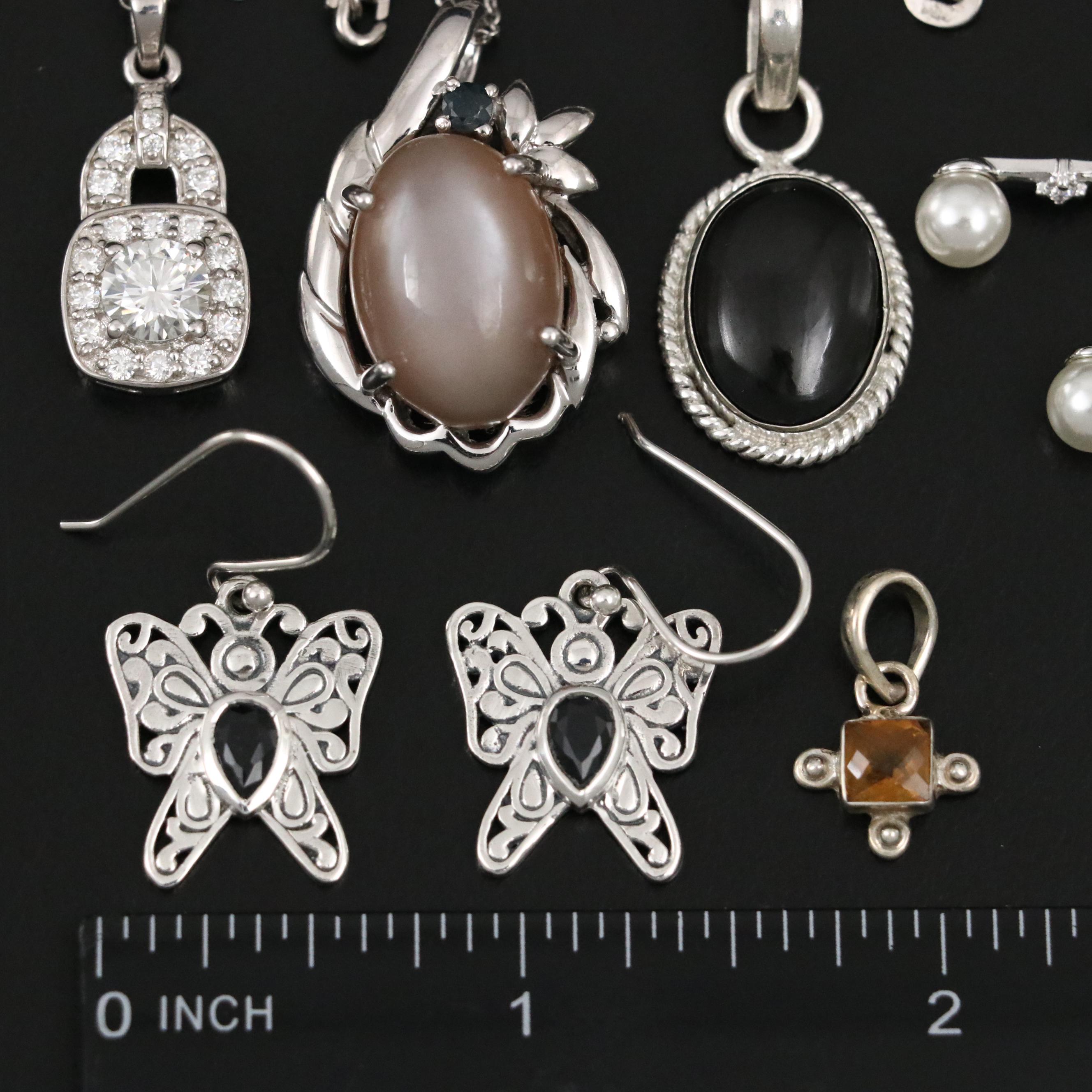 Group of 14 Assorted Sterling Silver Rings, Necklaces, Earrings, and Pendants