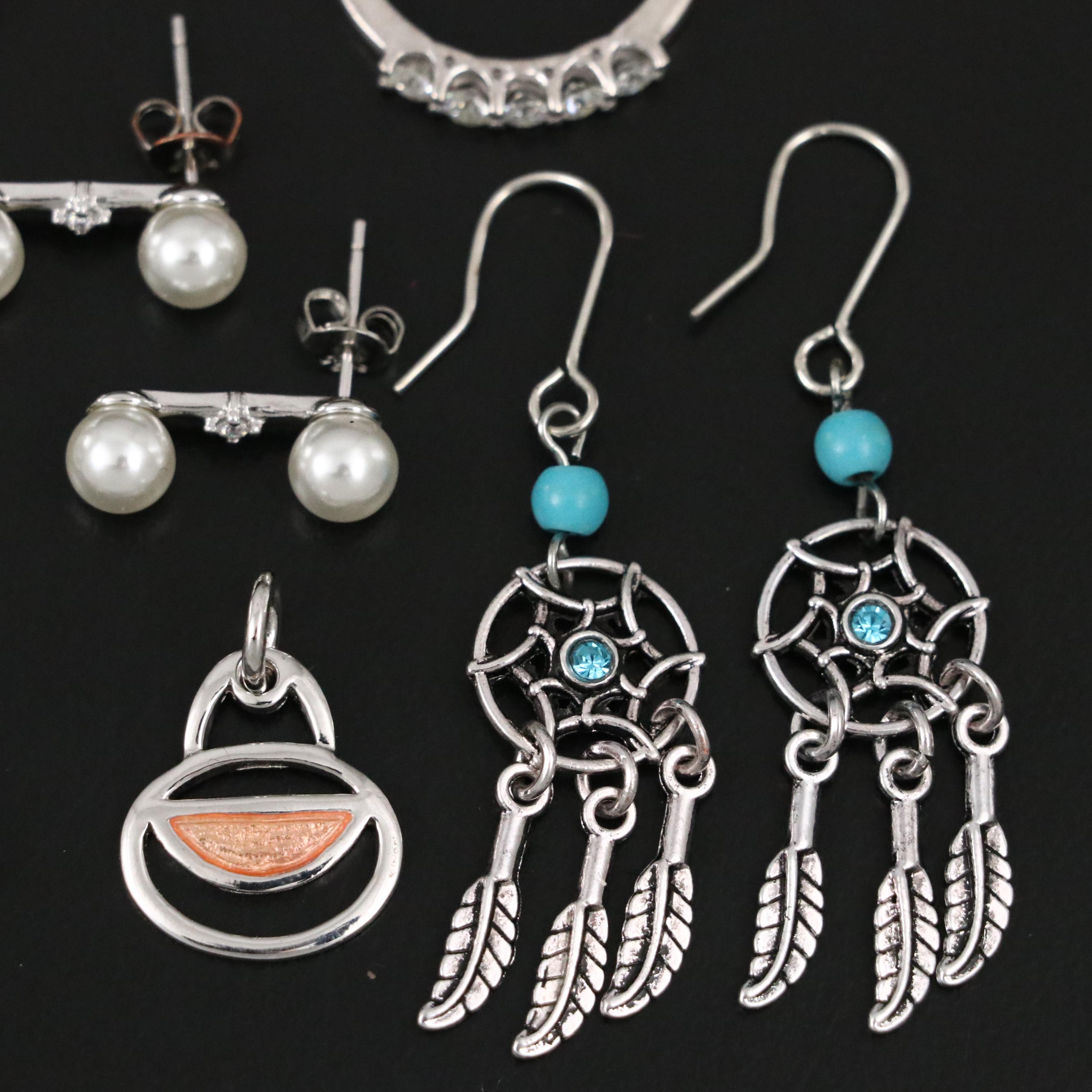 Group of 14 Assorted Sterling Silver Rings, Necklaces, Earrings, and Pendants