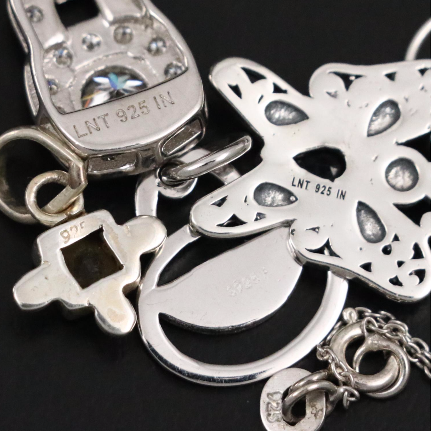 Group of 14 Assorted Sterling Silver Rings, Necklaces, Earrings, and Pendants