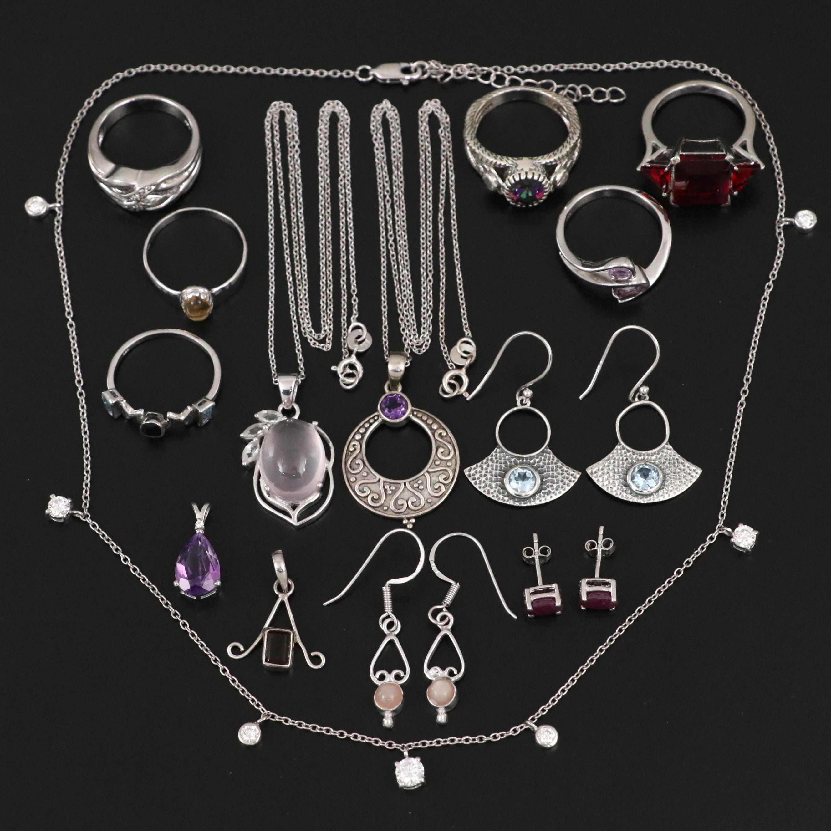 Group of 14 Assorted Sterling Silver Rings, Necklaces, Earrings, and Pendants