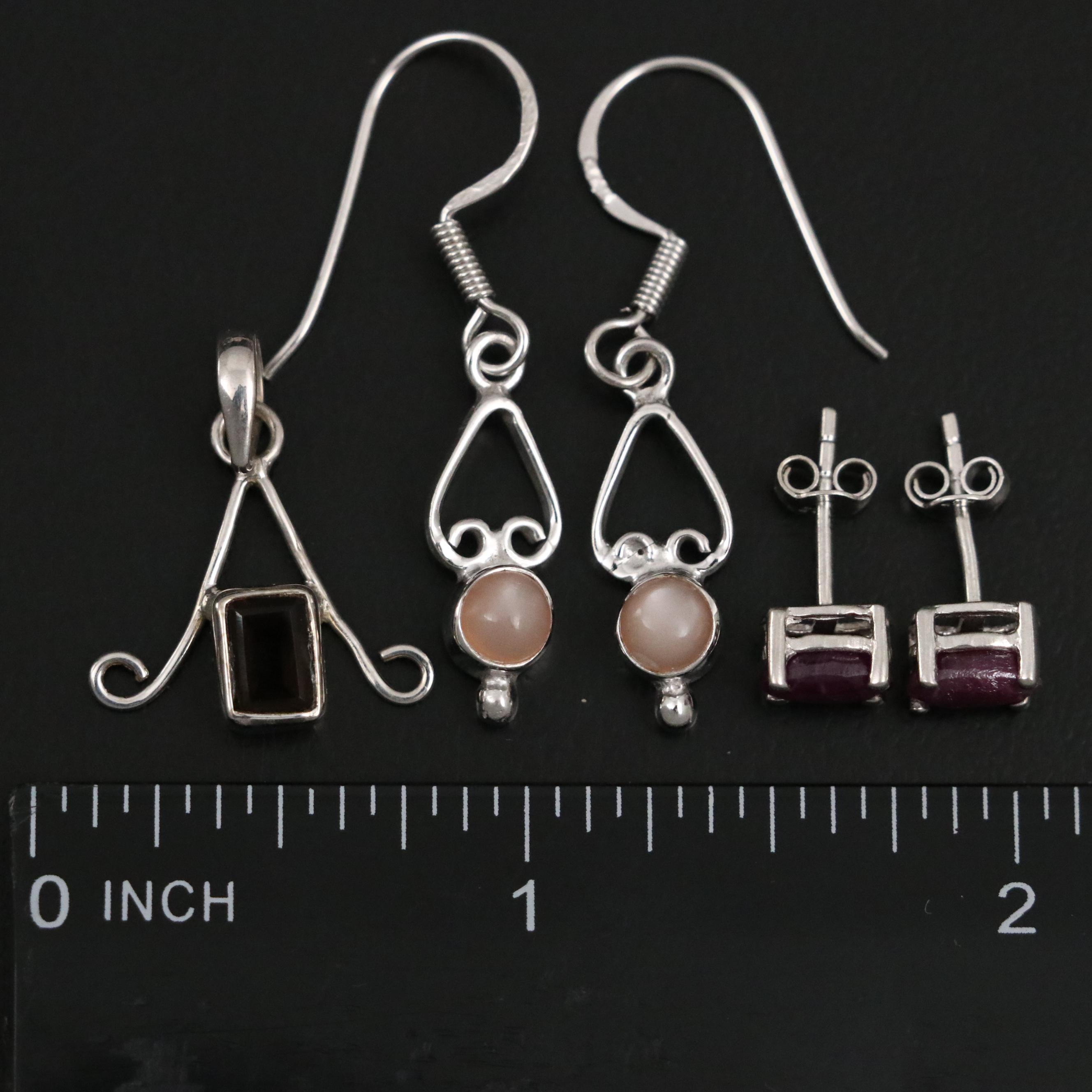 Group of 14 Assorted Sterling Silver Rings, Necklaces, Earrings, and Pendants