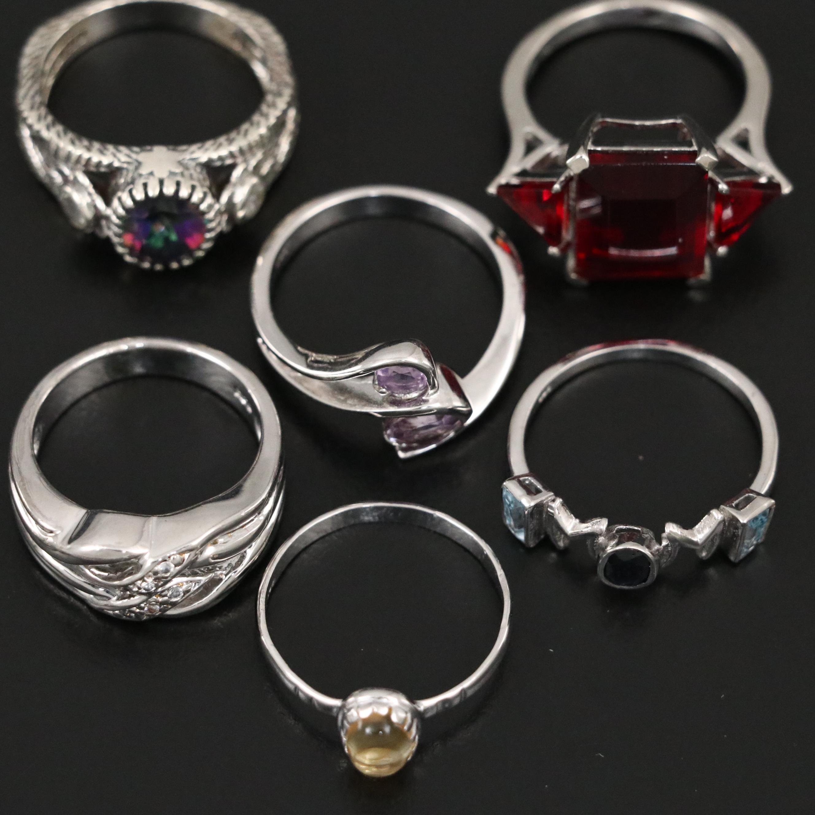 Group of 14 Assorted Sterling Silver Rings, Necklaces, Earrings, and Pendants