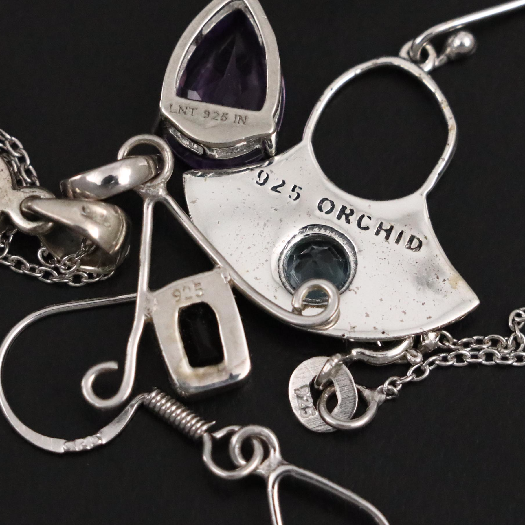 Group of 14 Assorted Sterling Silver Rings, Necklaces, Earrings, and Pendants