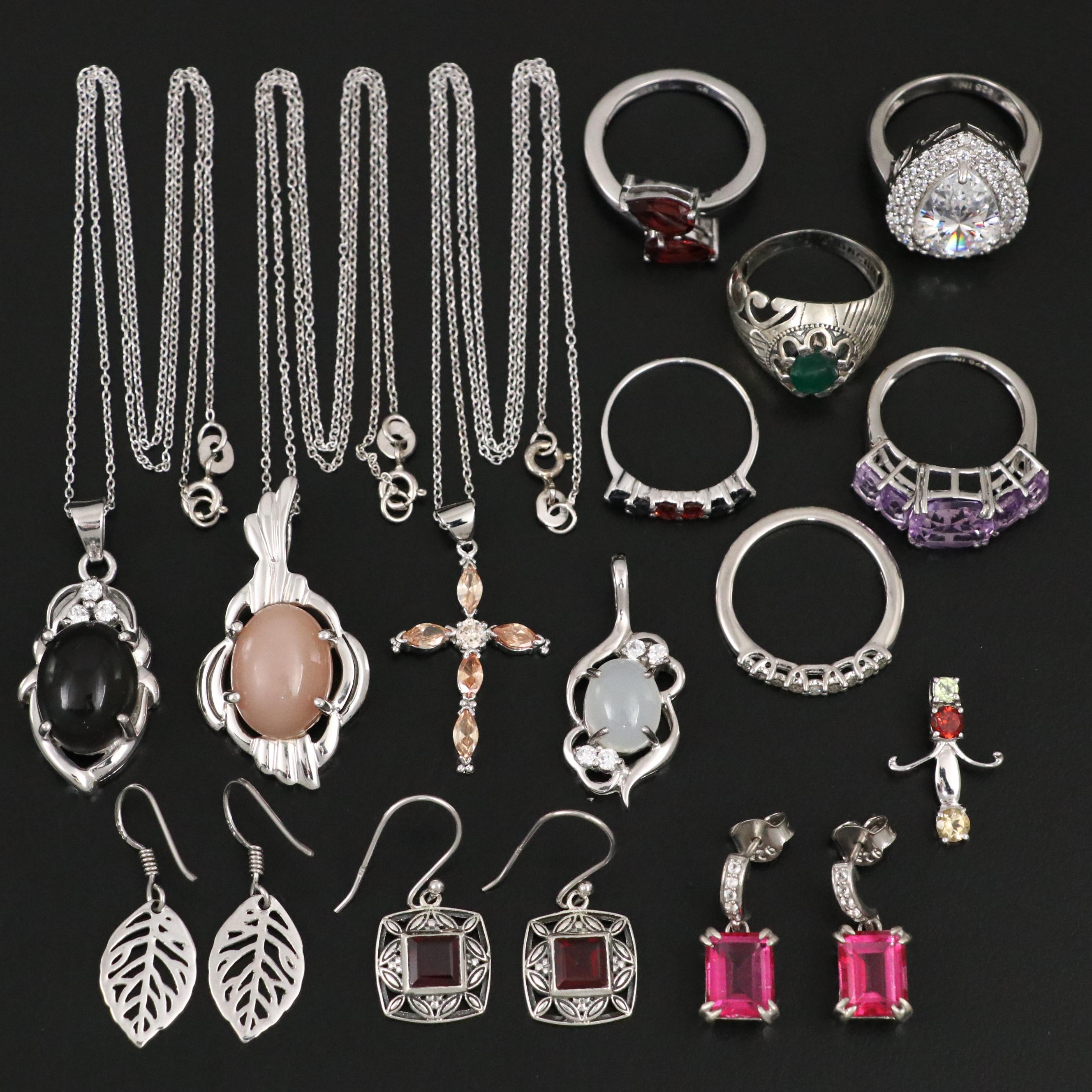 Group of 14 Assorted Sterling Silver Rings, Necklaces, Earrings, and Pendants