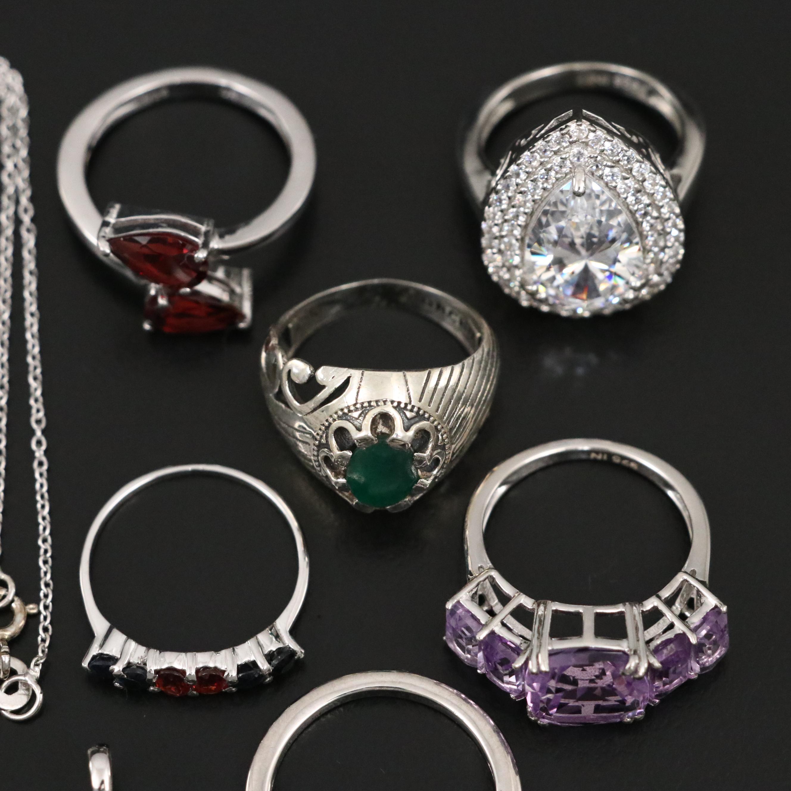 Group of 14 Assorted Sterling Silver Rings, Necklaces, Earrings, and Pendants
