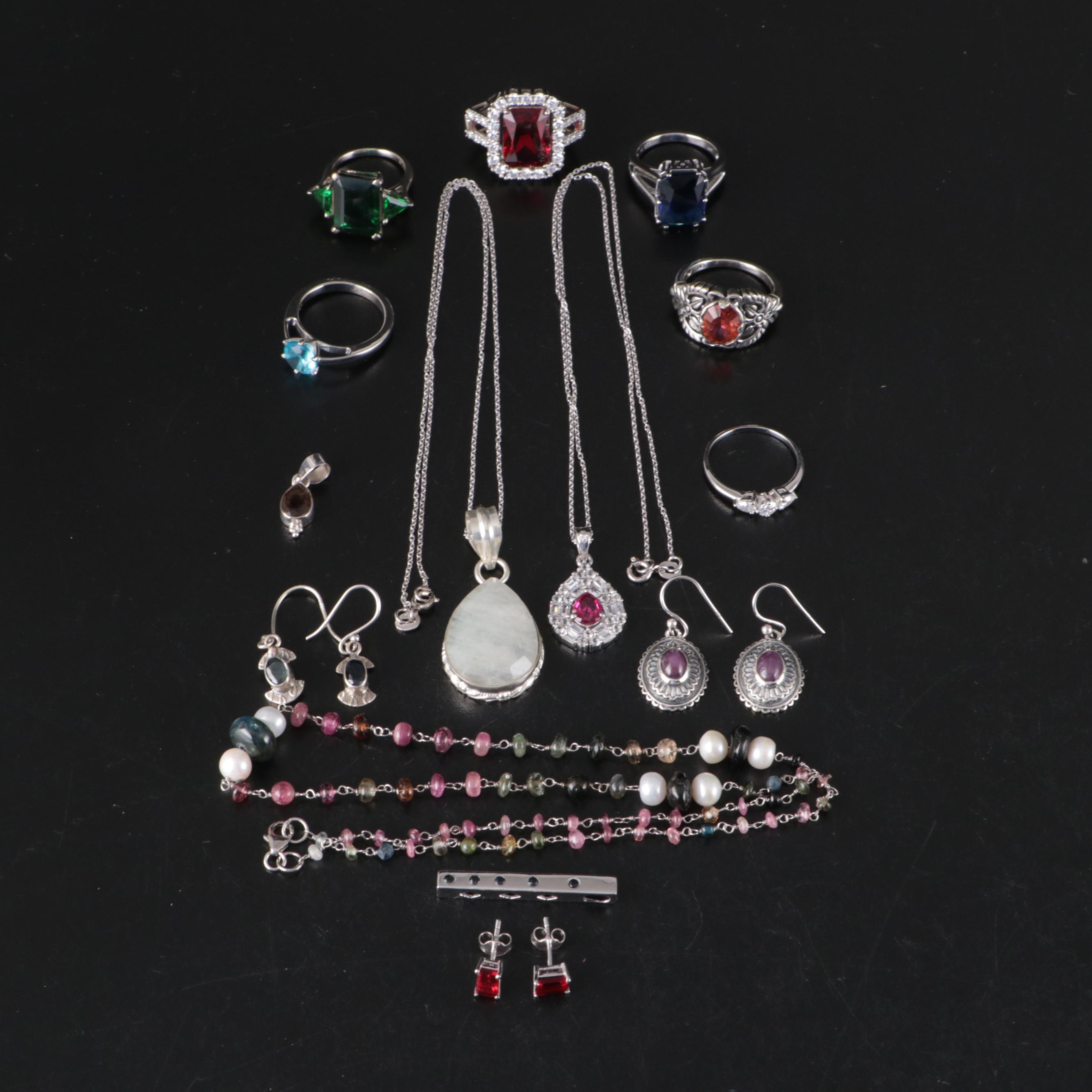 Group of 14 Assorted Sterling Silver Rings, Necklaces, Earrings, and Pendants