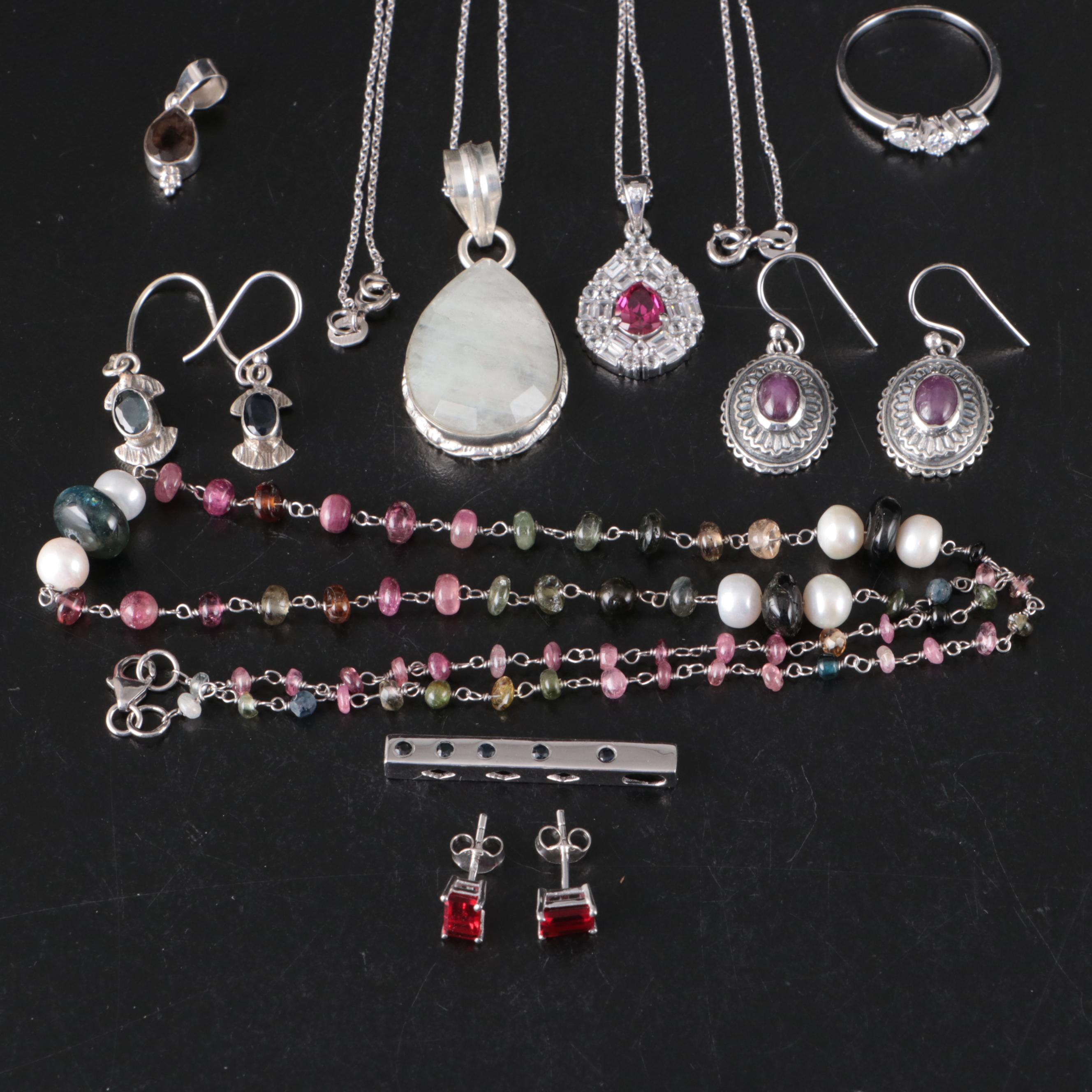 Group of 14 Assorted Sterling Silver Rings, Necklaces, Earrings, and Pendants