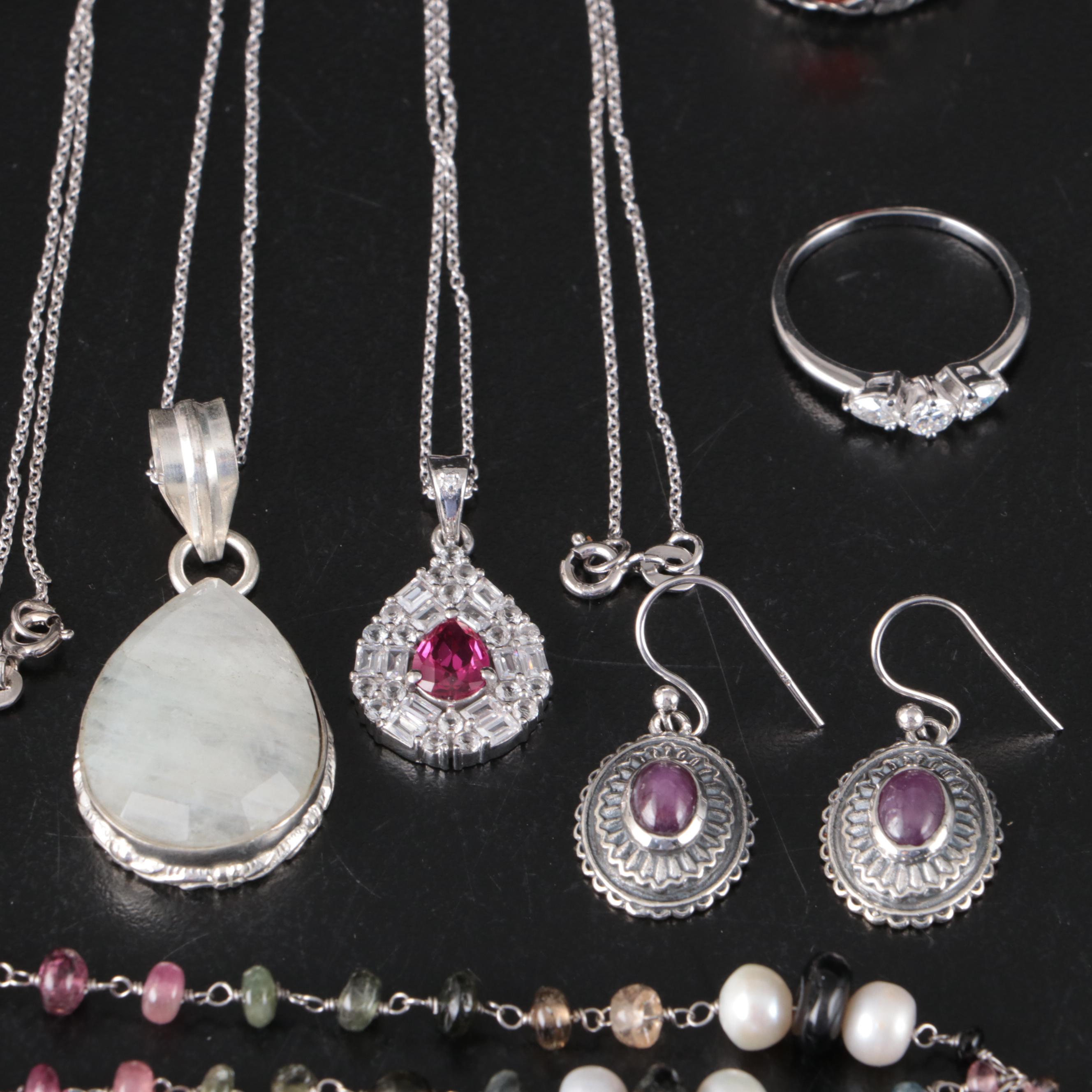 Group of 14 Assorted Sterling Silver Rings, Necklaces, Earrings, and Pendants