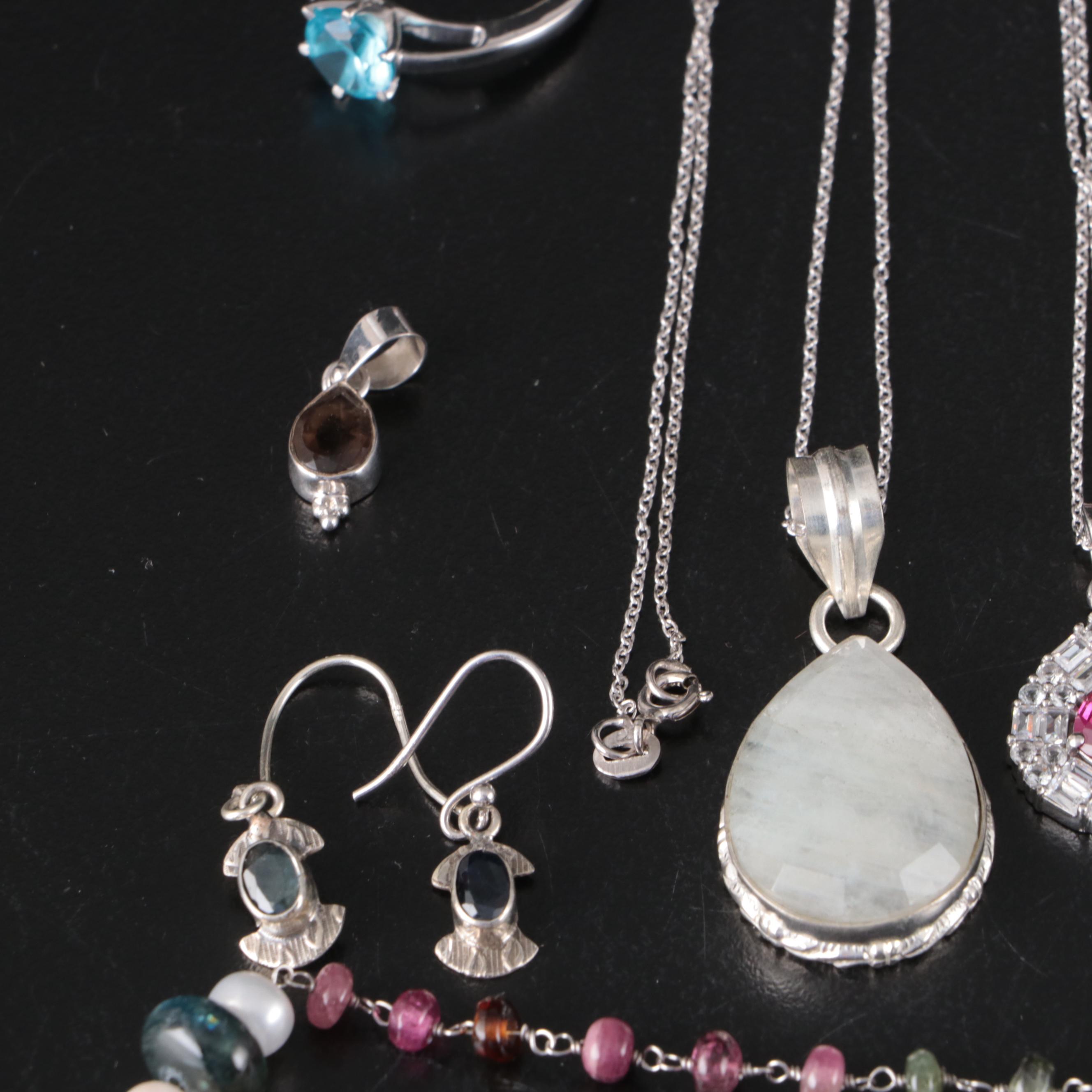 Group of 14 Assorted Sterling Silver Rings, Necklaces, Earrings, and Pendants