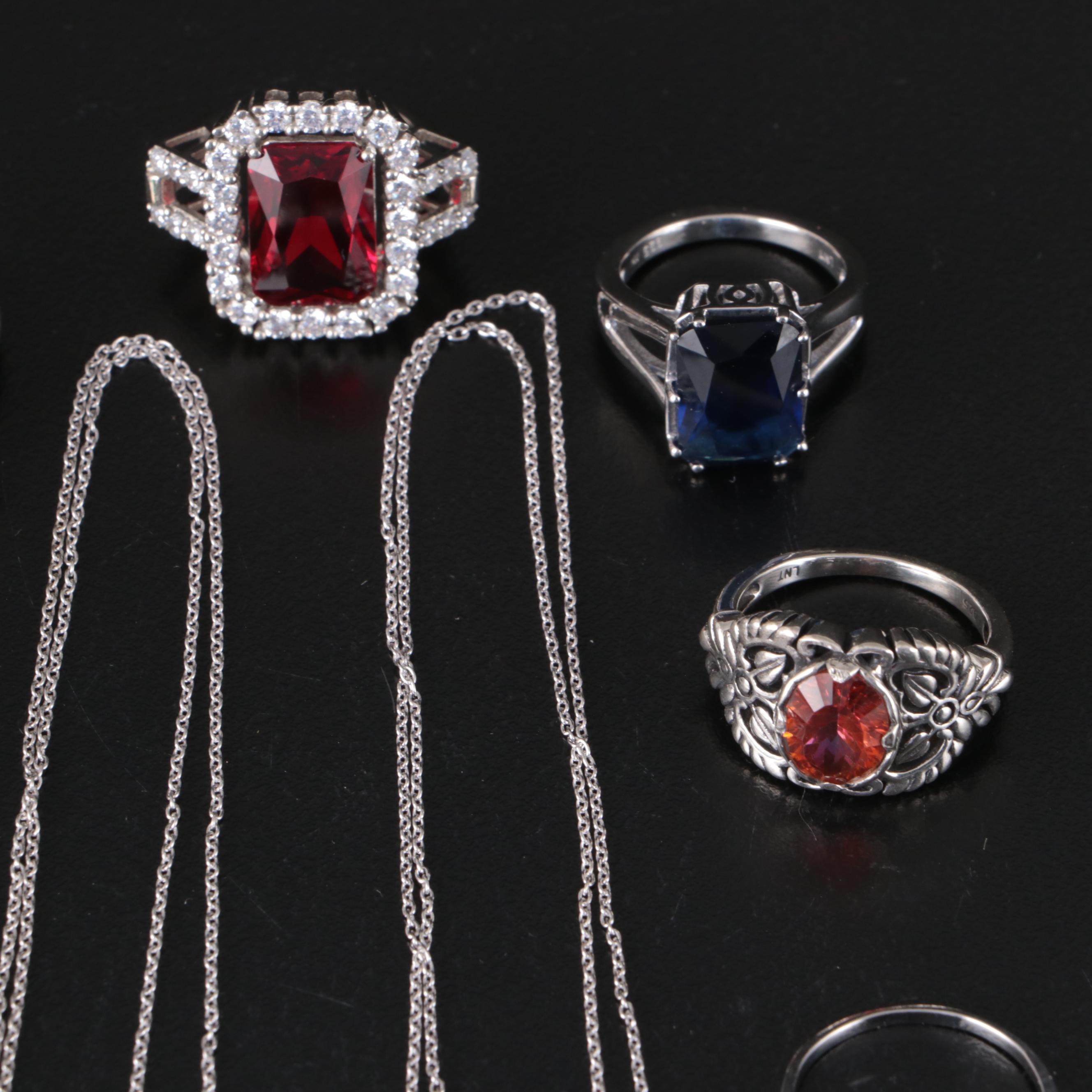 Group of 14 Assorted Sterling Silver Rings, Necklaces, Earrings, and Pendants