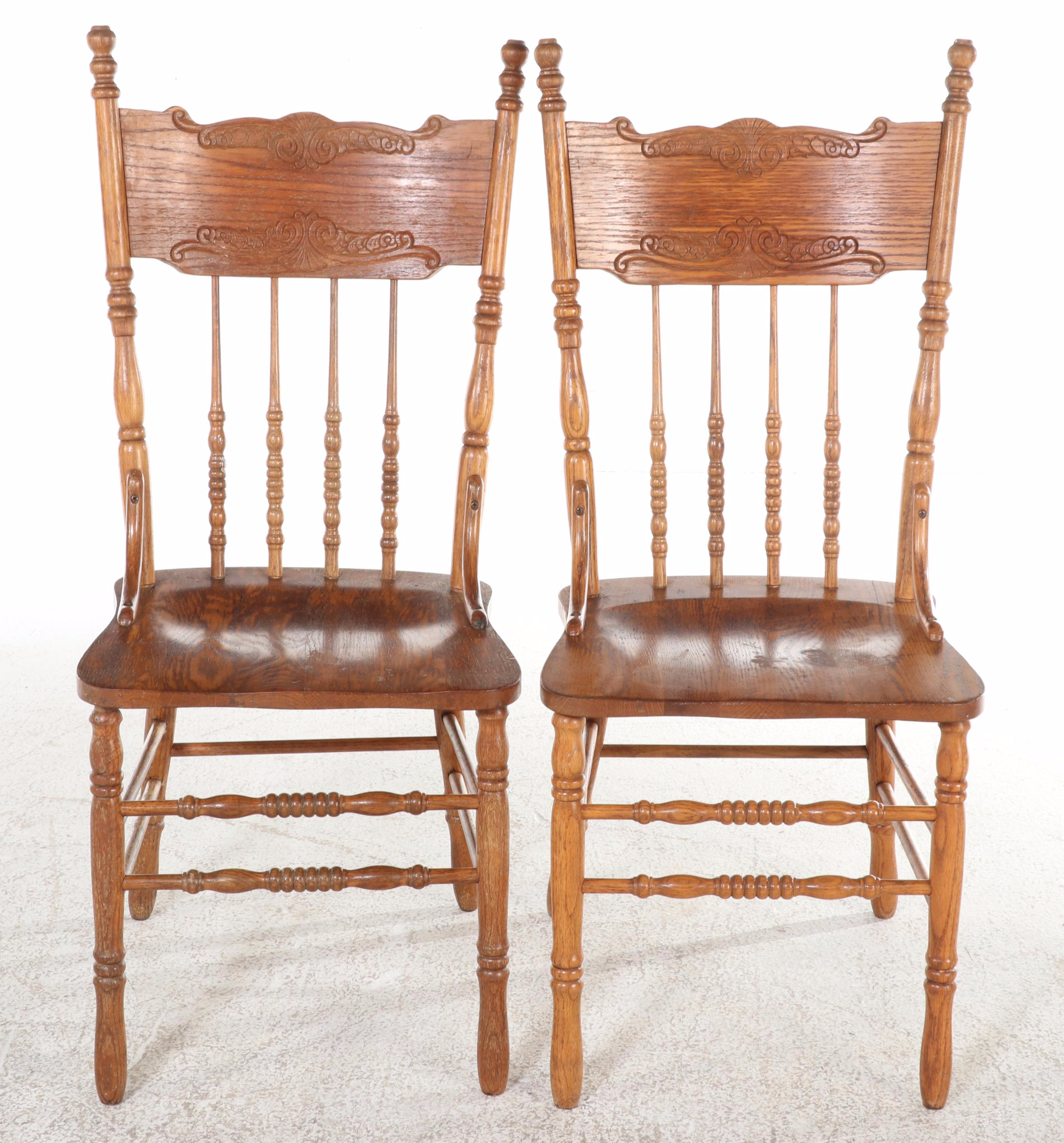 Four H.W. Hull & Sons Victorian Style Oak and Pressed-Back Dining Side Chairs