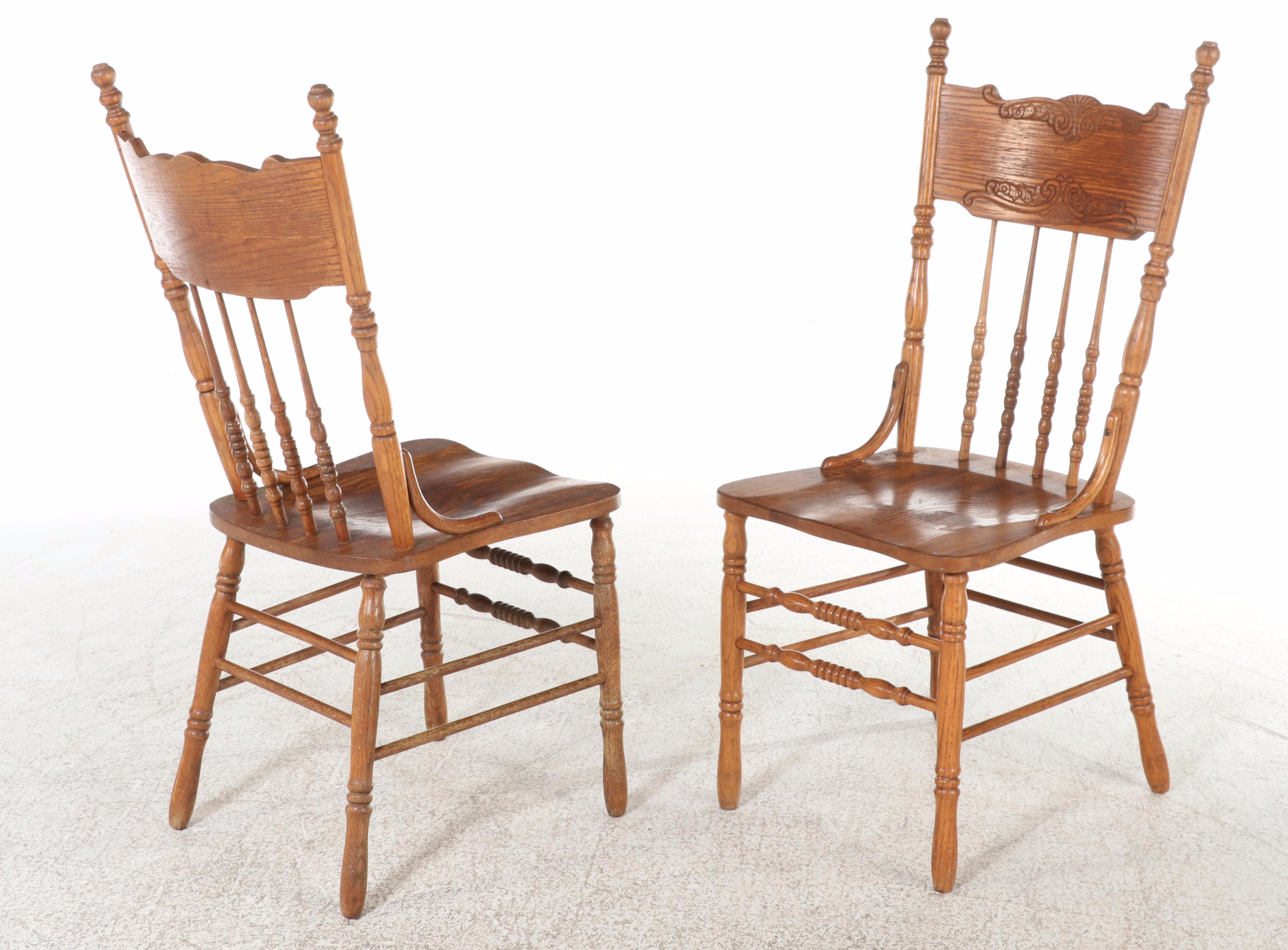 Four H.W. Hull & Sons Victorian Style Oak and Pressed-Back Dining Side Chairs