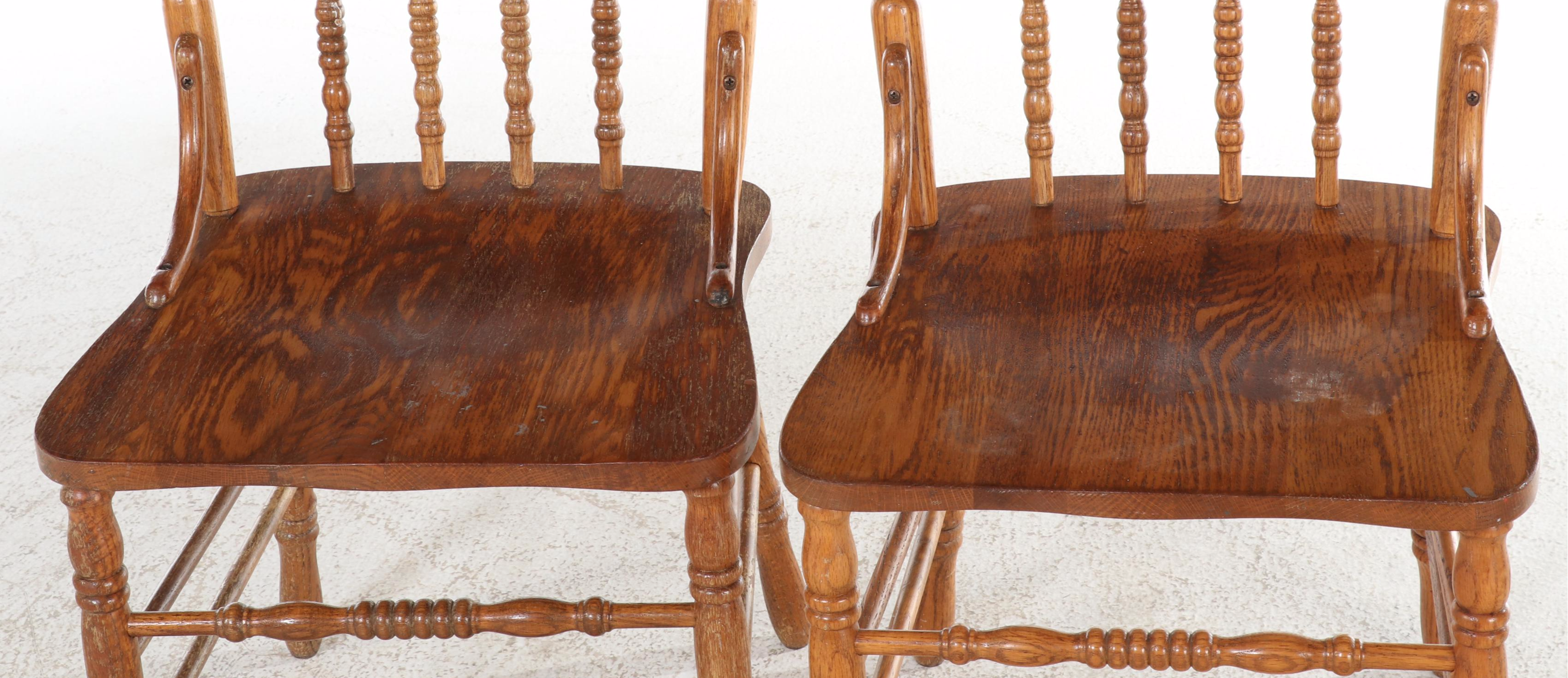 Four H.W. Hull & Sons Victorian Style Oak and Pressed-Back Dining Side Chairs