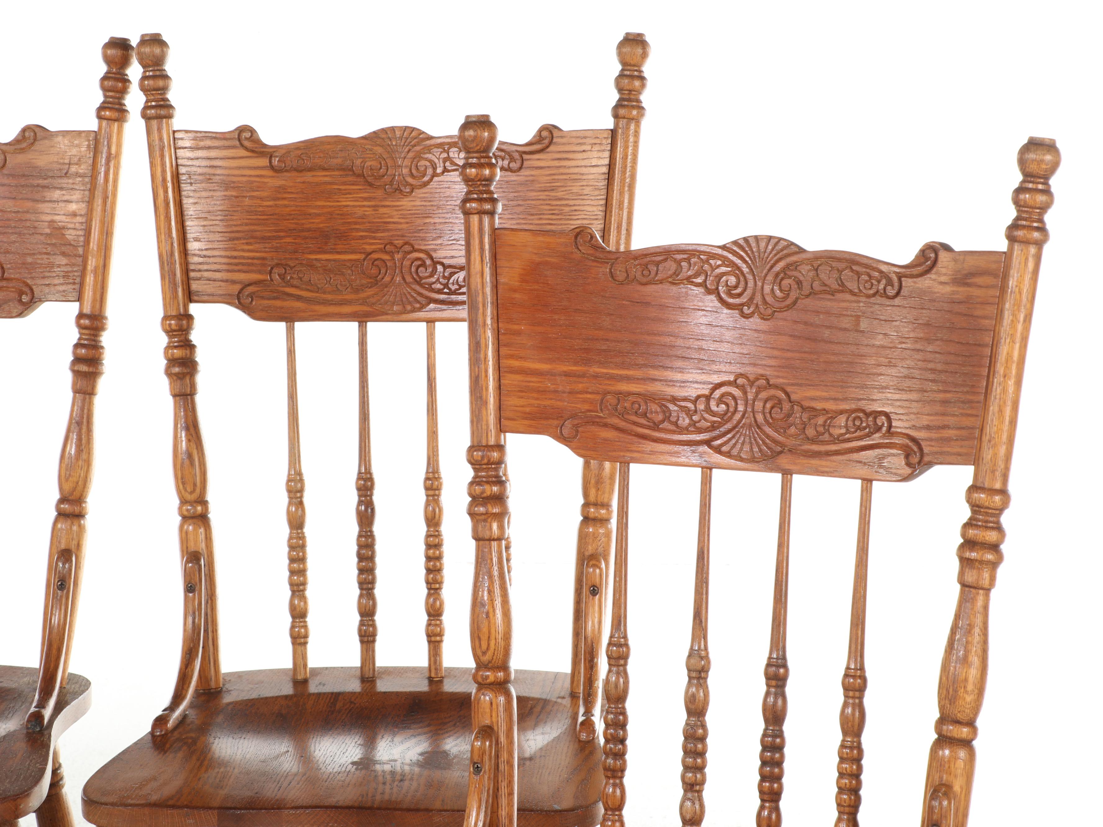 Four H.W. Hull & Sons Victorian Style Oak and Pressed-Back Dining Side Chairs