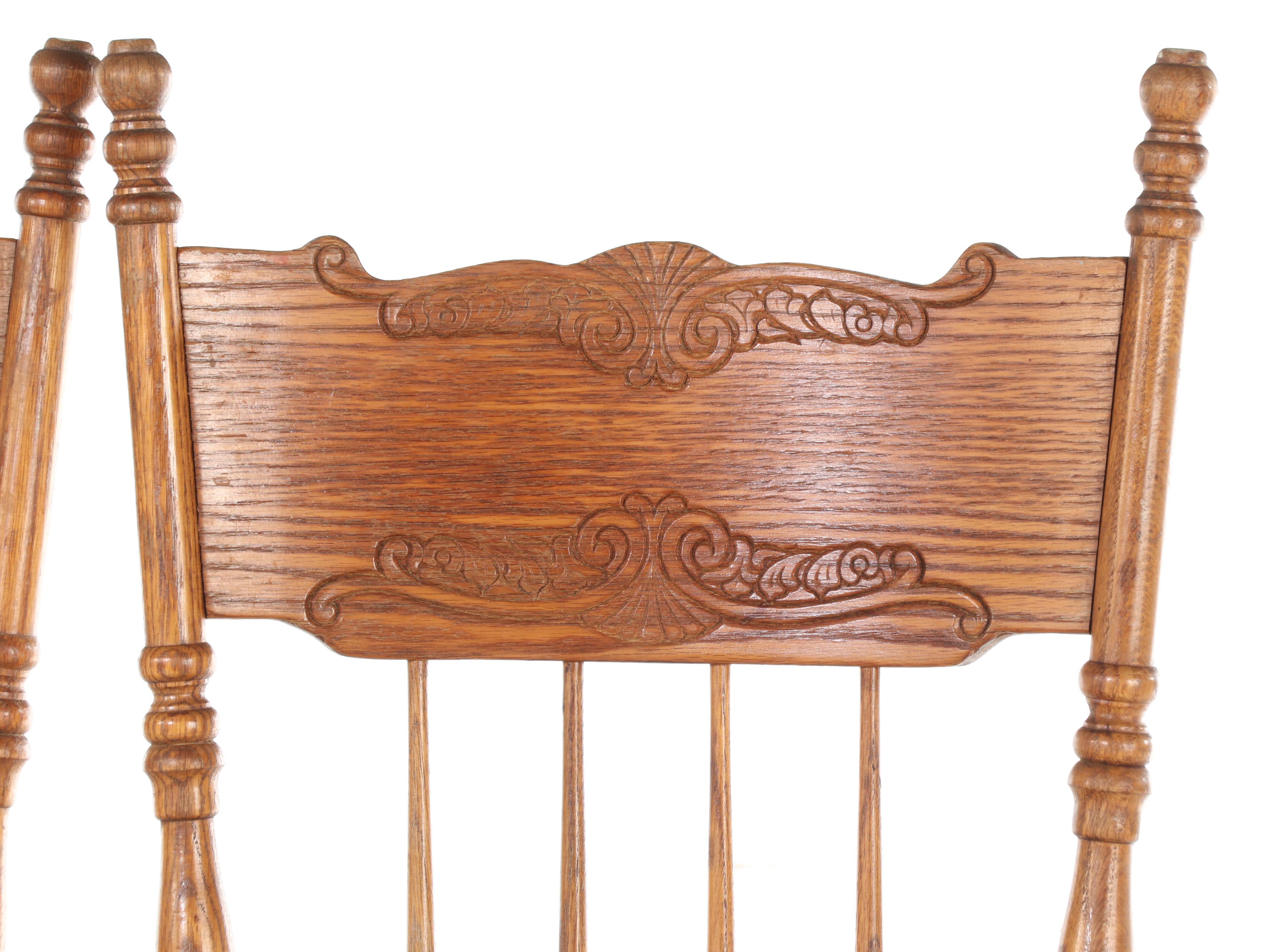 Four H.W. Hull & Sons Victorian Style Oak and Pressed-Back Dining Side Chairs