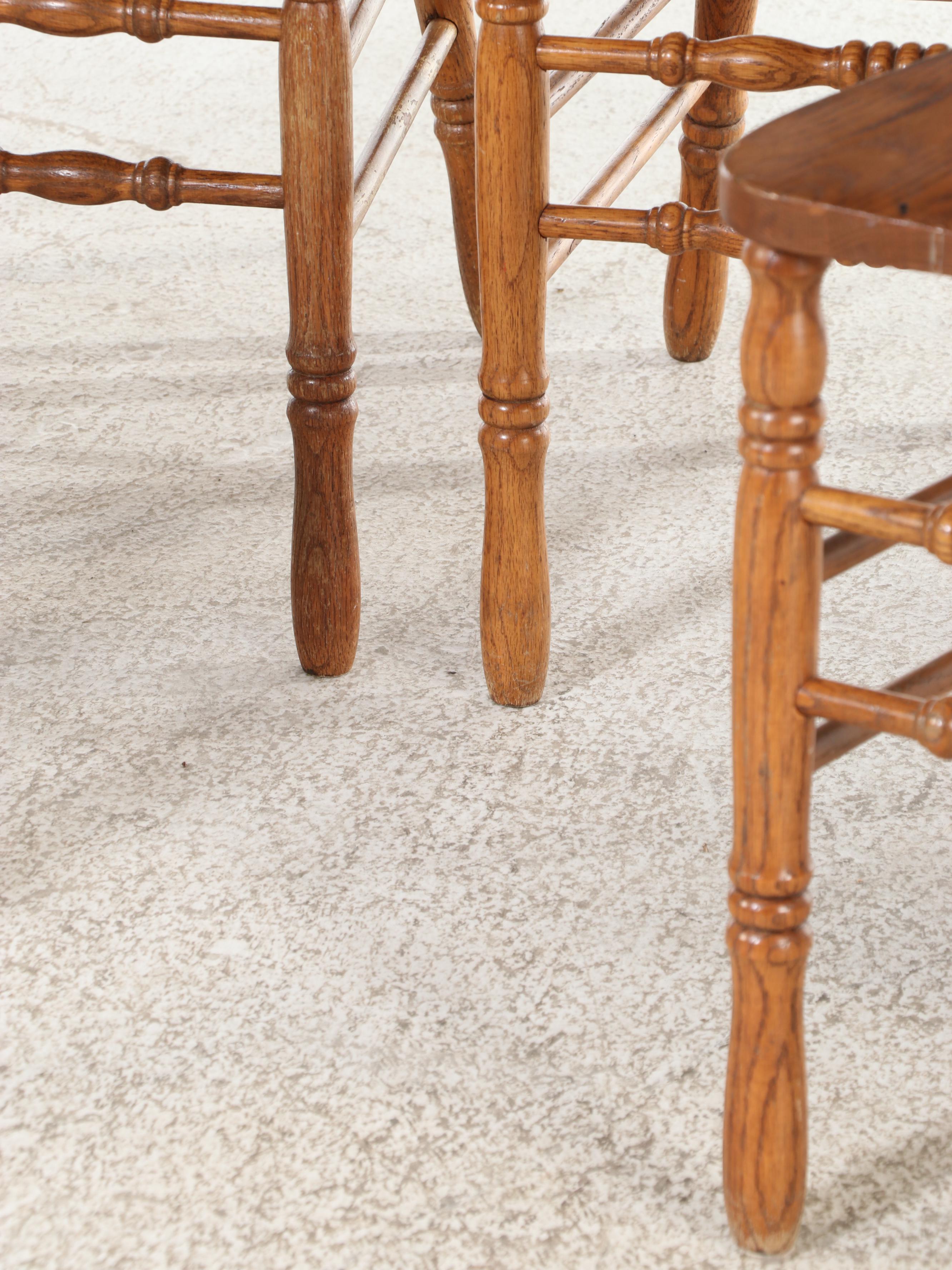 Four H.W. Hull & Sons Victorian Style Oak and Pressed-Back Dining Side Chairs