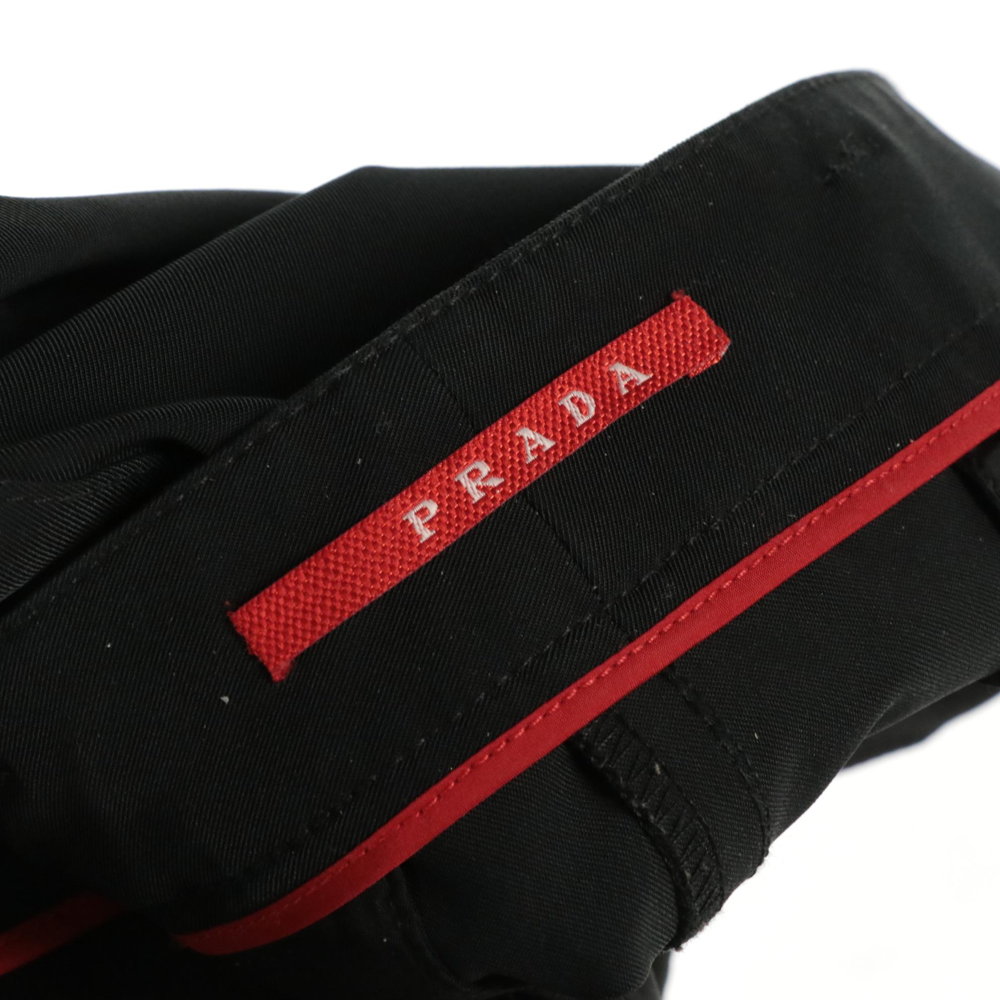 Prada Double-Breasted Belted Jacket and Black Straight Leg Trousers