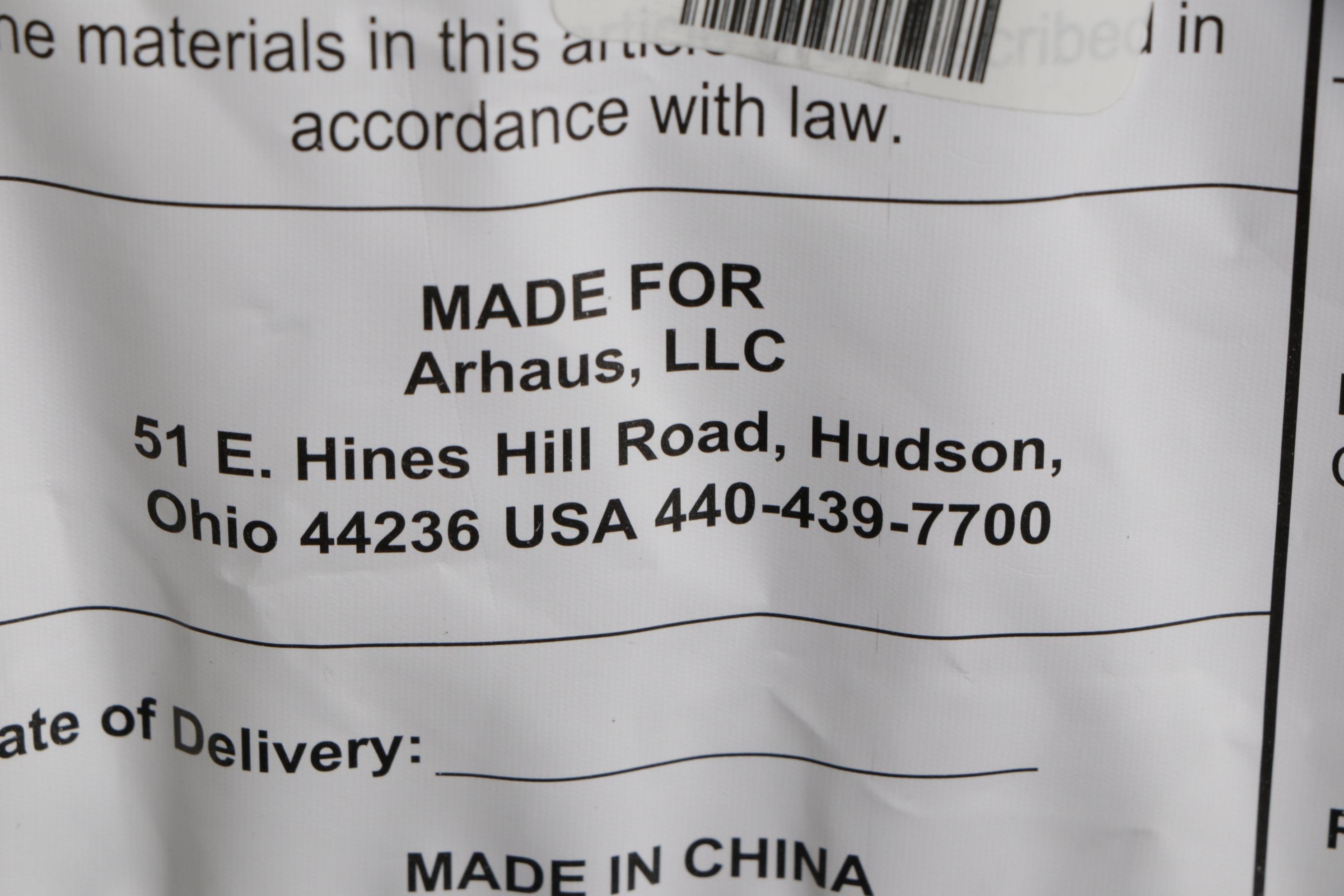 Arhaus "Deacon" Graphite Leather Swivel Chair and Ottoman, 2022