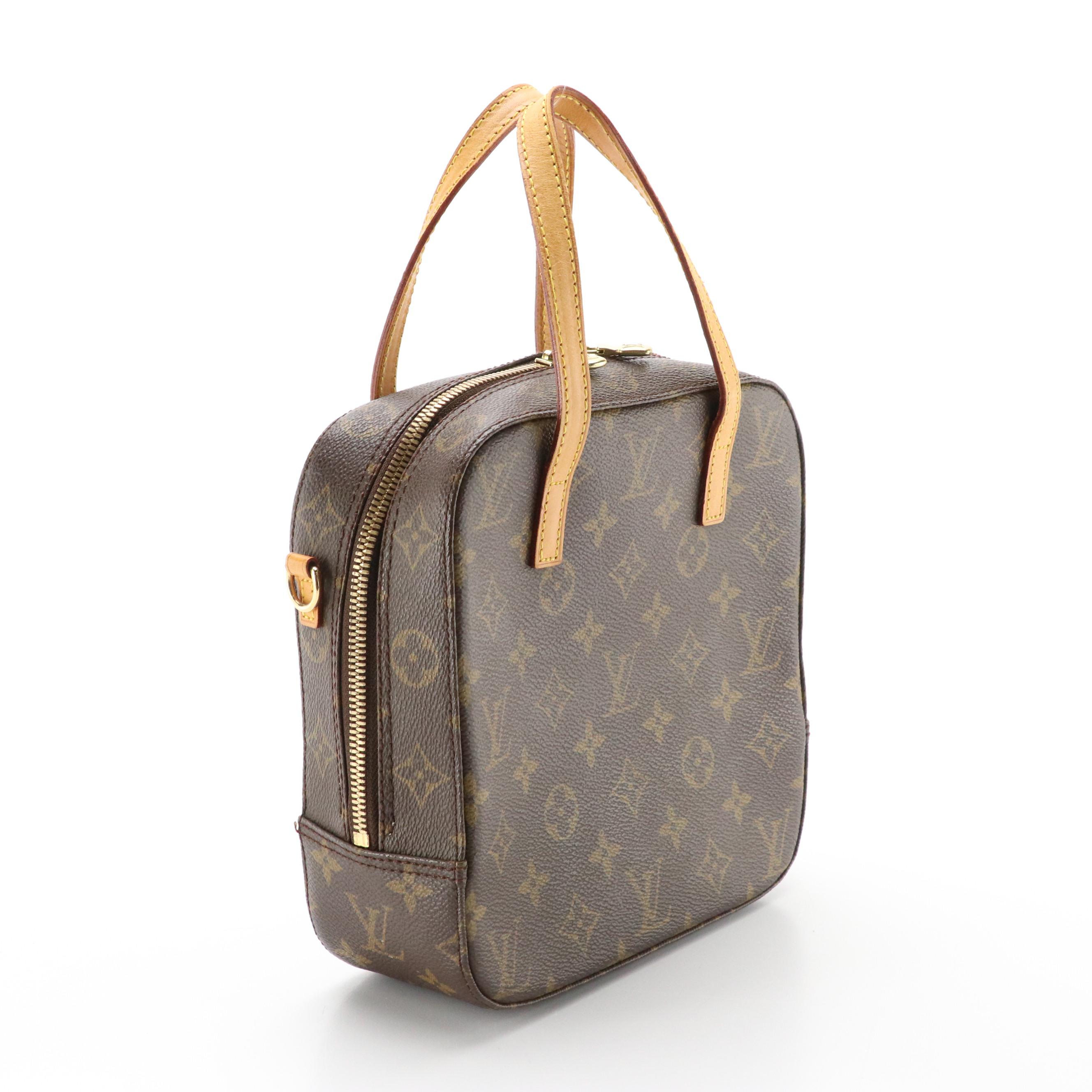Louis Vuitton Spontini Handbag in Monogram Canvas and Vachetta Leather