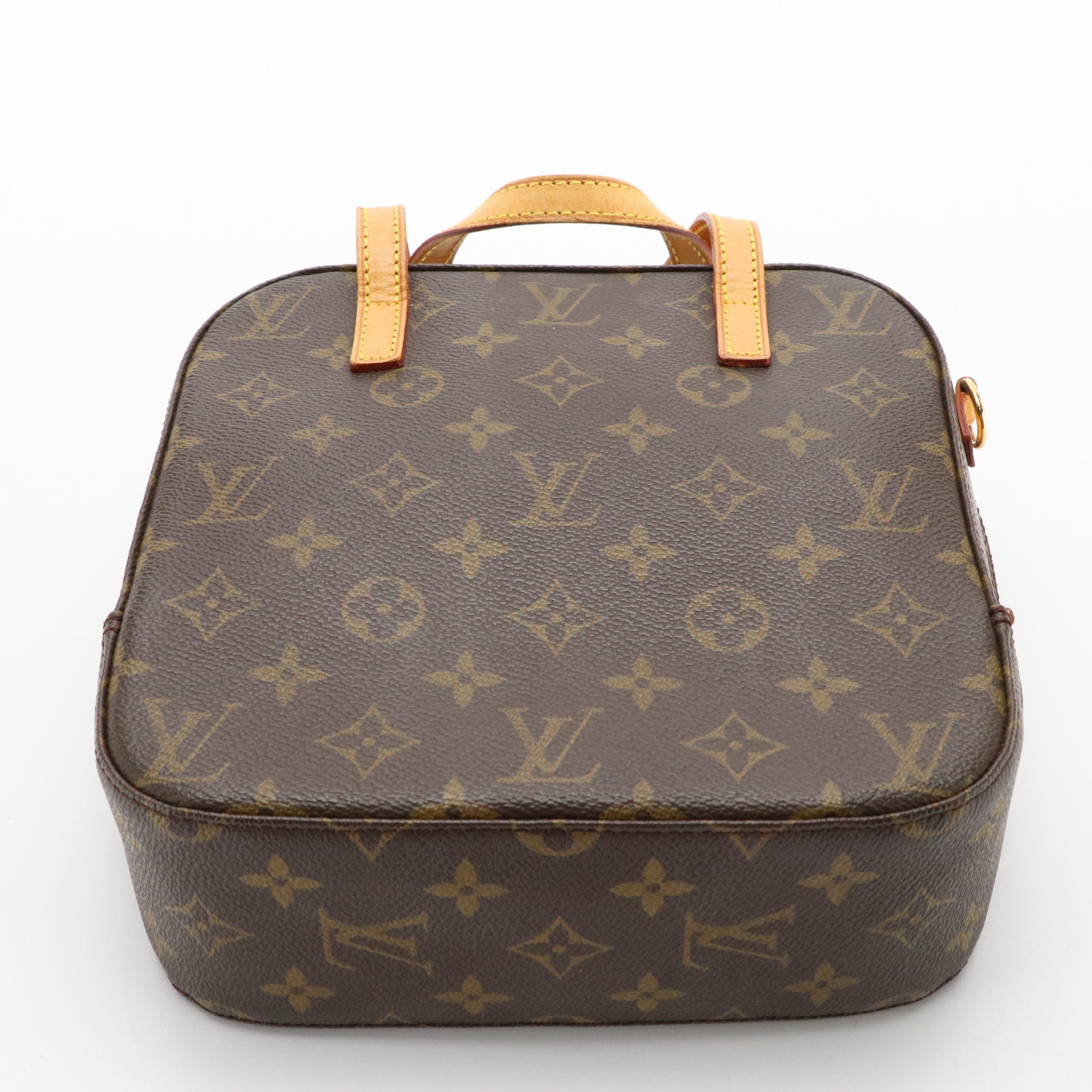 Louis Vuitton Spontini Handbag in Monogram Canvas and Vachetta Leather