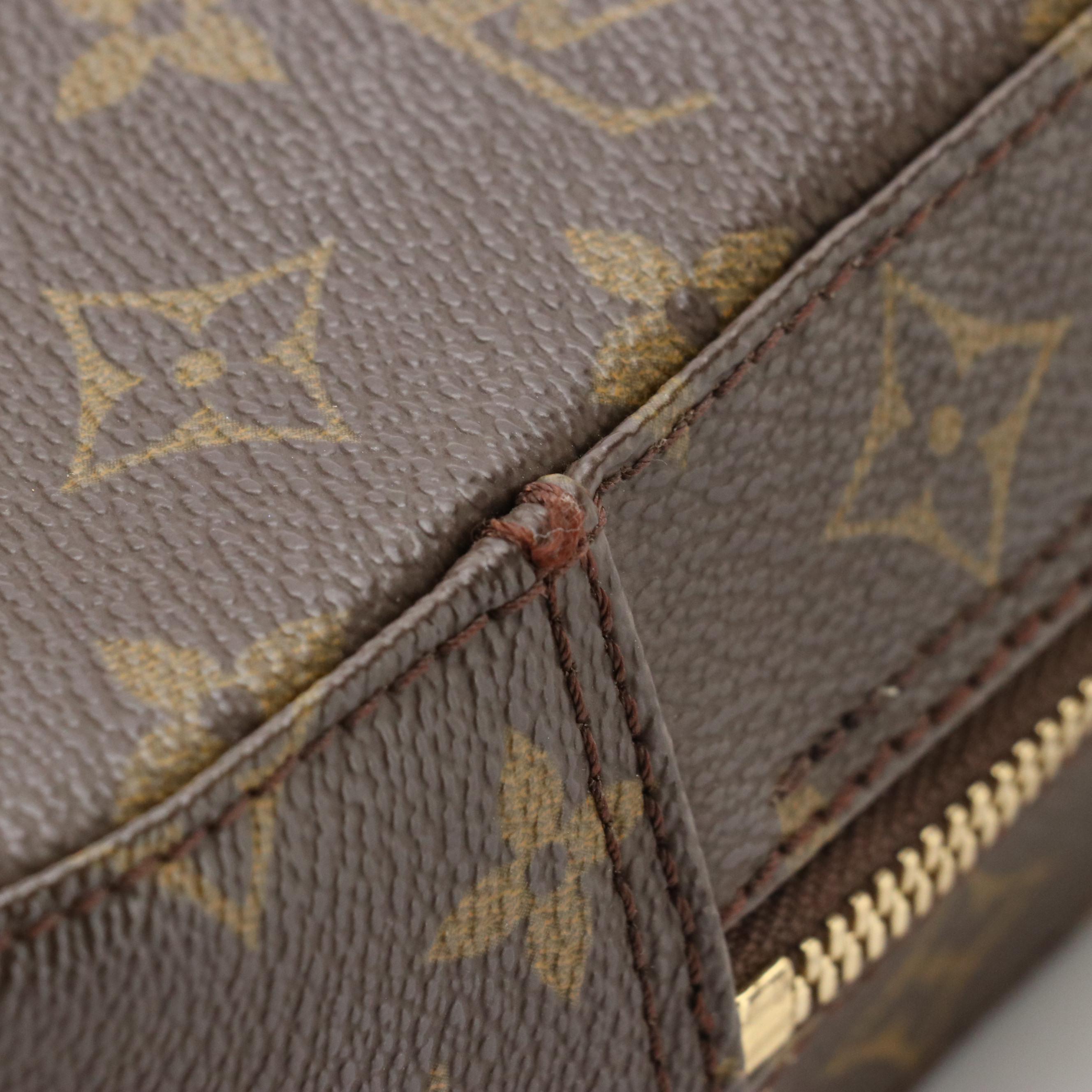 Louis Vuitton Spontini Handbag in Monogram Canvas and Vachetta Leather