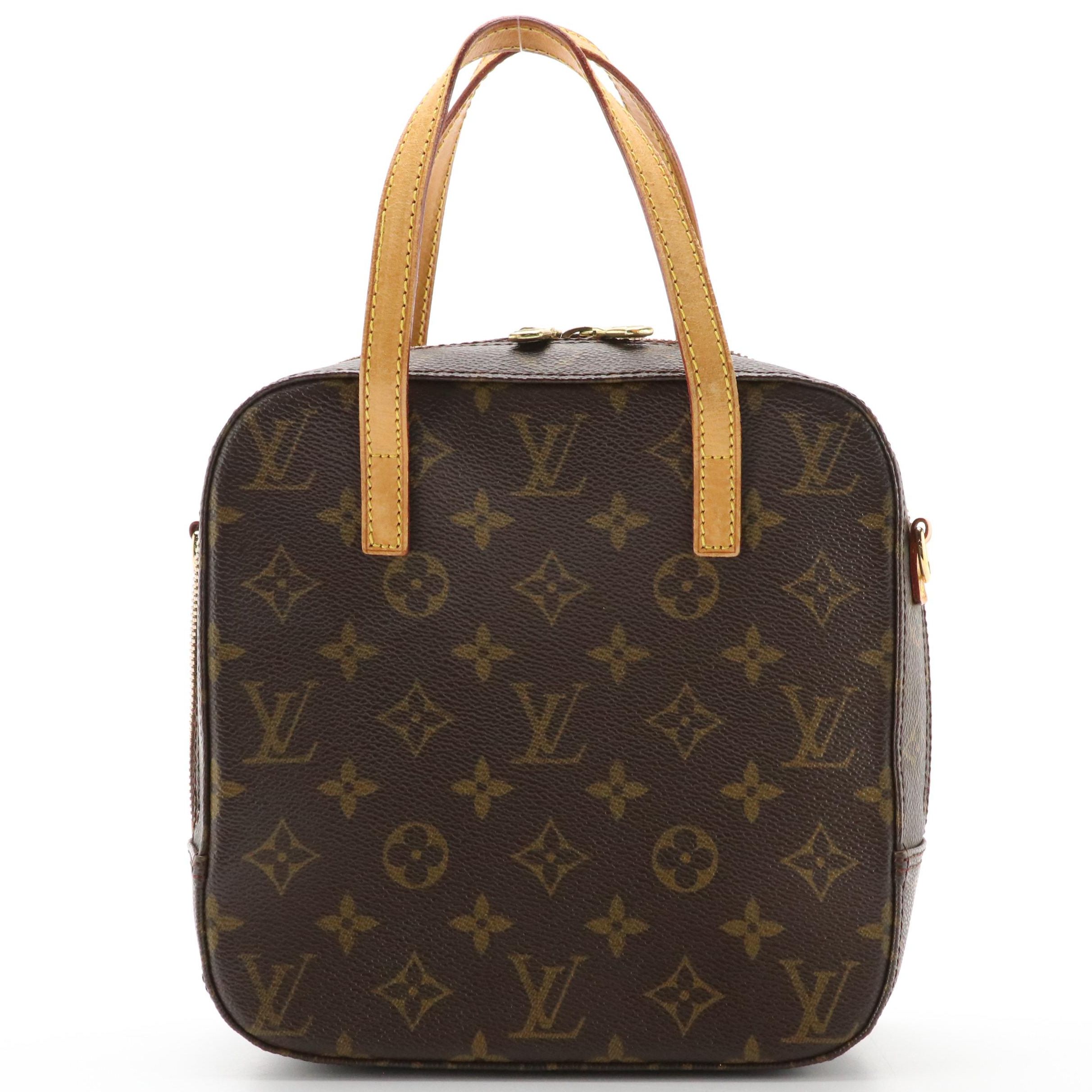 Louis Vuitton Spontini Handbag in Monogram Canvas and Vachetta Leather