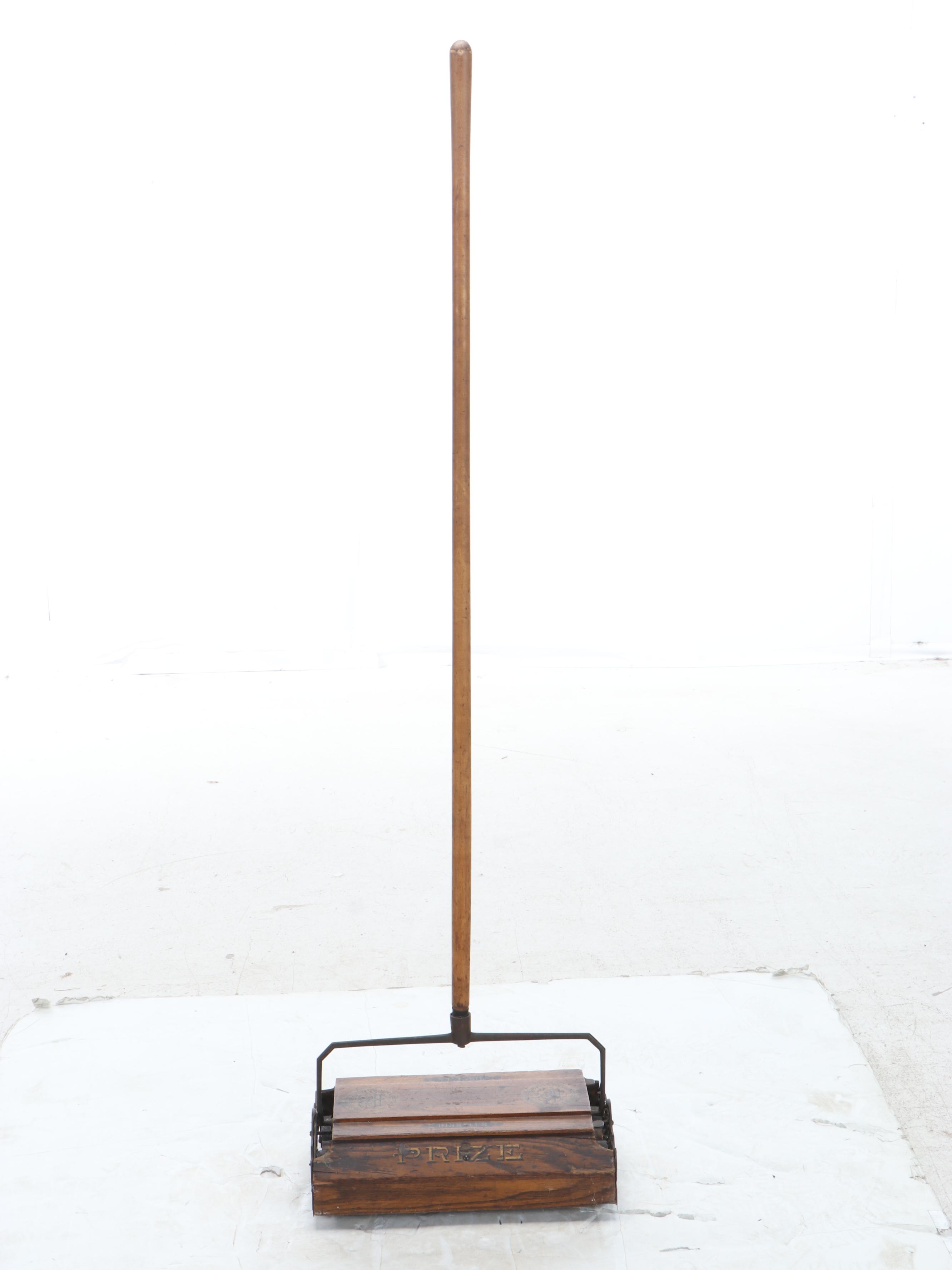 Bissell "Prize" Sweeper with Folding Clothing Rack and Yard Sticks