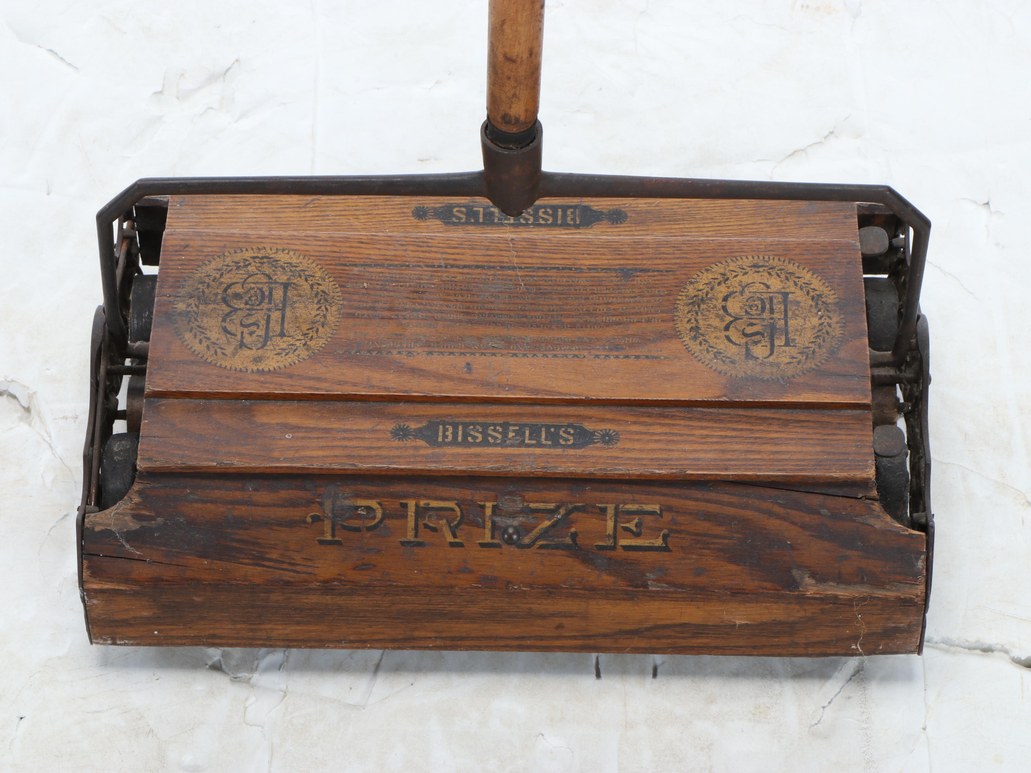 Bissell "Prize" Sweeper with Folding Clothing Rack and Yard Sticks