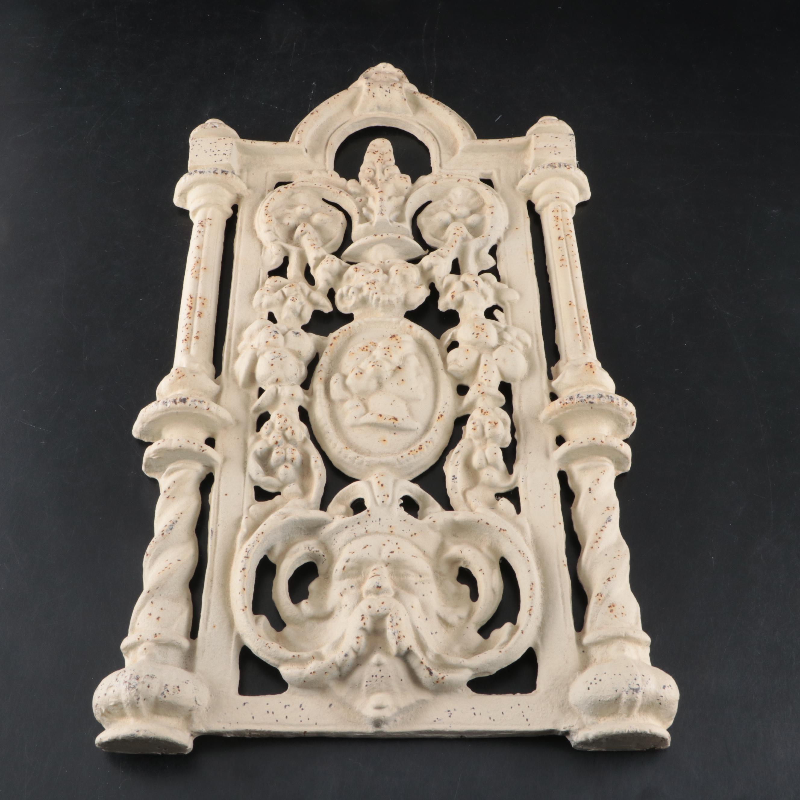Baroque Style Cast Iron Wall Sculpture with Cherub Motif Cast Iron Wall Shelf