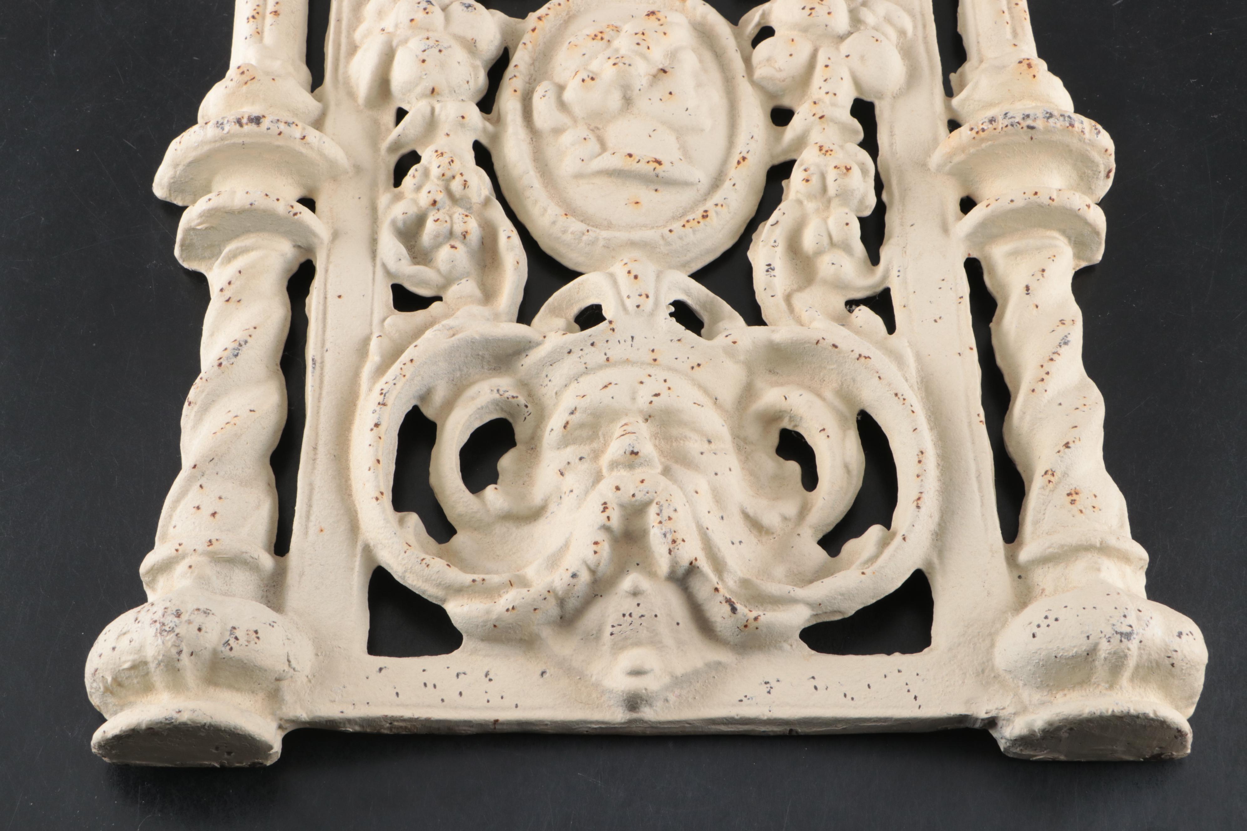Baroque Style Cast Iron Wall Sculpture with Cherub Motif Cast Iron Wall Shelf
