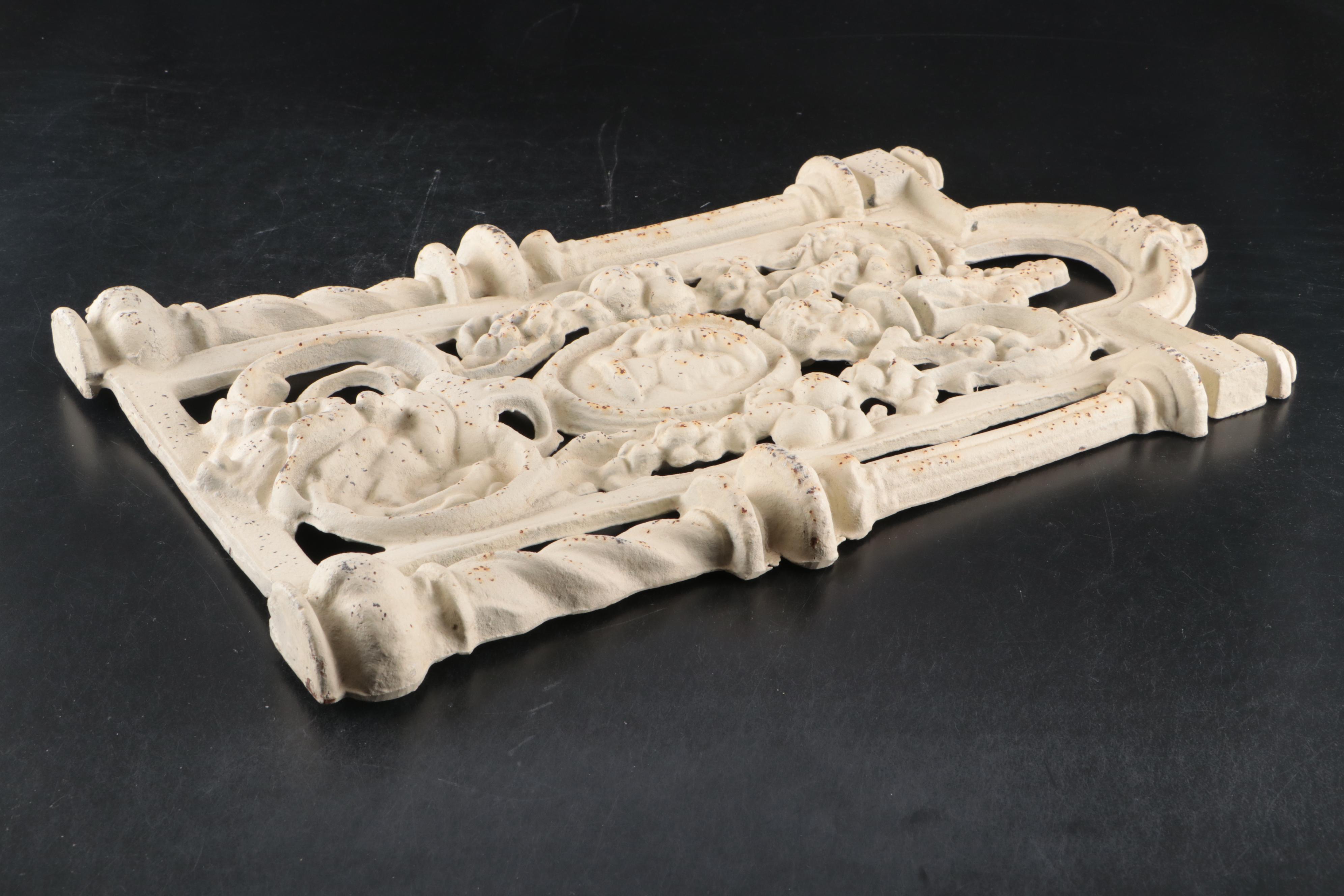 Baroque Style Cast Iron Wall Sculpture with Cherub Motif Cast Iron Wall Shelf